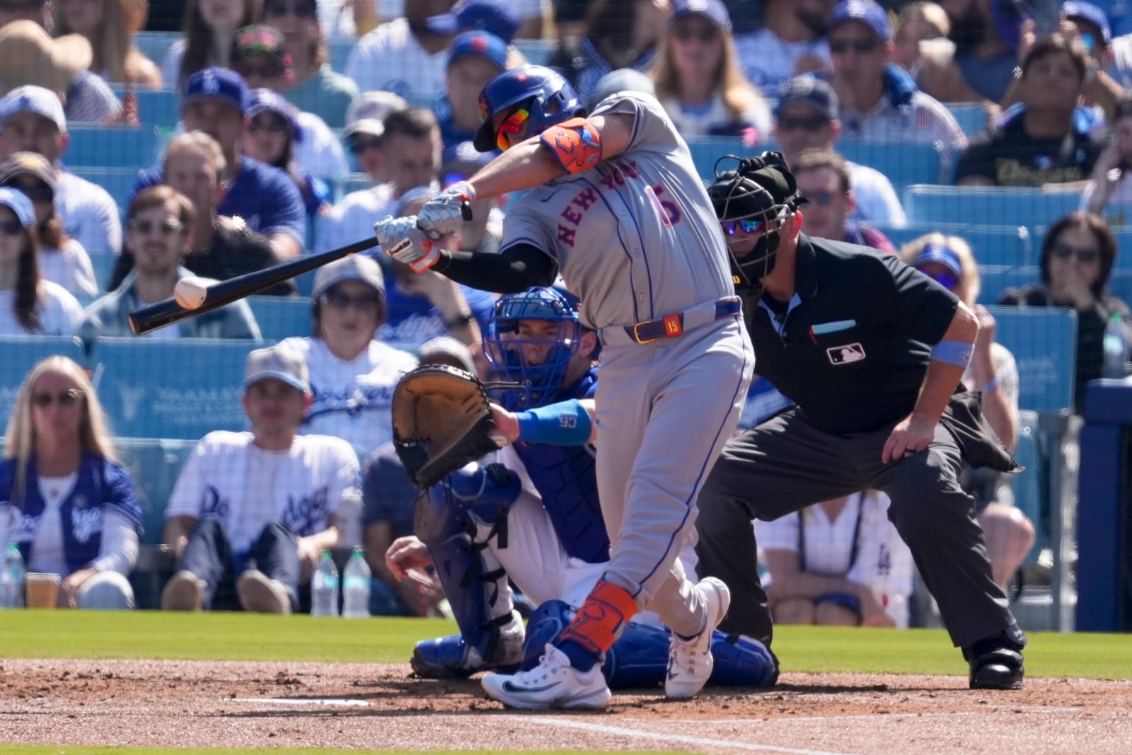 New York Mets' Tyrone Taylor hits an RBI-double against the Los Angeles Dodgers during the second inning in Game 2 of a baseball NL Championship Series, Monday, Oct. 14, 2024, in Los Angeles. (AP Photo/Mark J. Terrill)