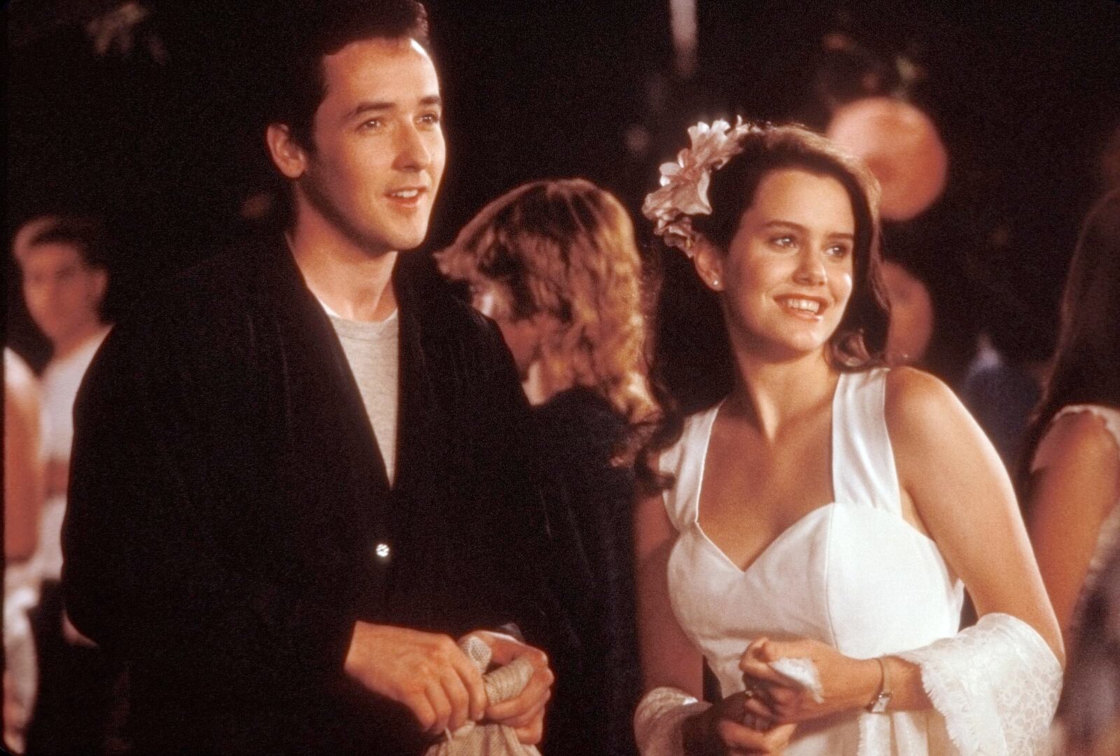 Lloyd Dobler (John Cusack) and Diane Court (Ione Skye) hit a high school party in the 1989 romantic comedy "Say Anything."