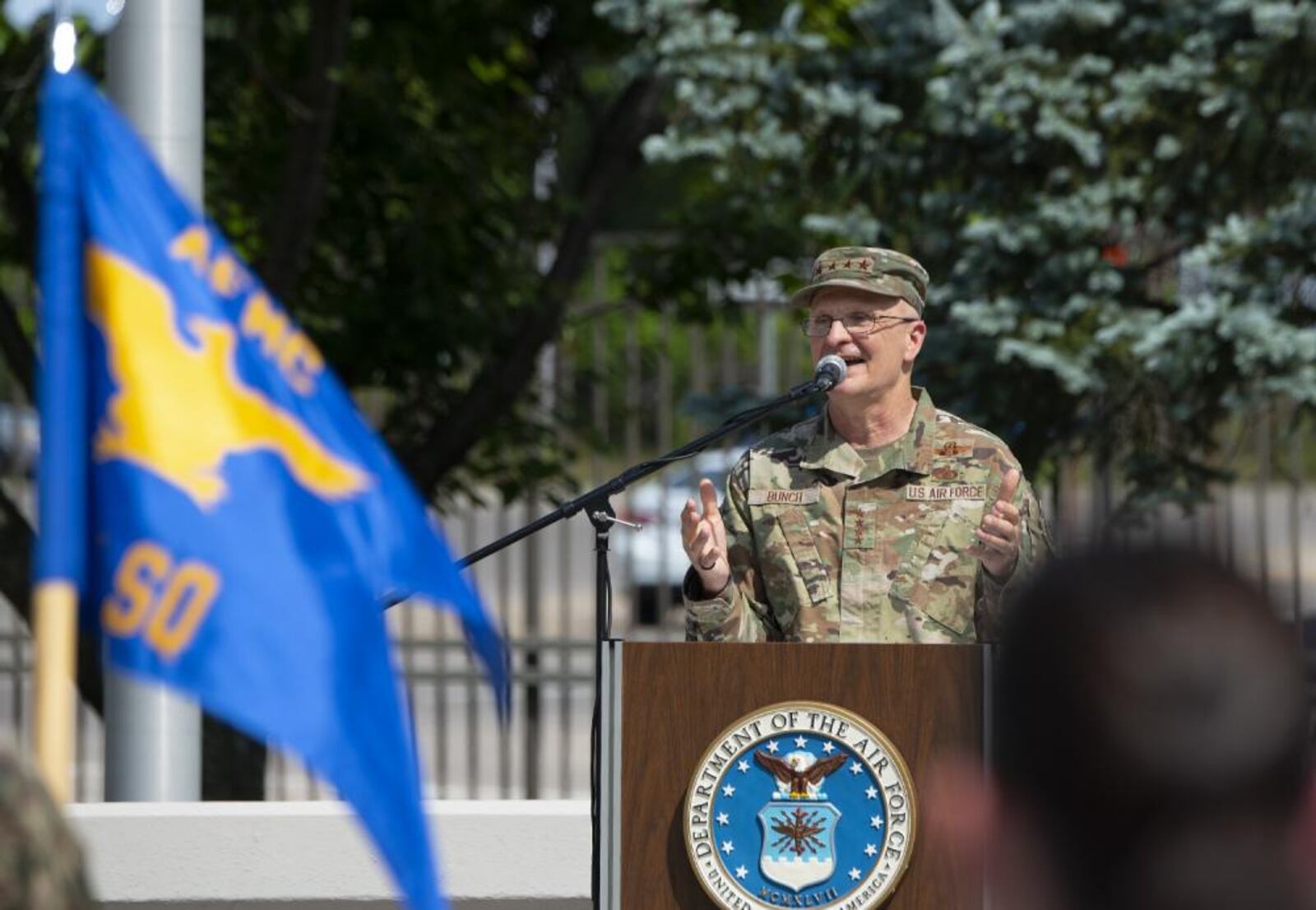 Gen. Arnold W. Bunch, Jr., Air Force Materiel Command commander, speaks to headquarters staff members during a retreat ceremony in his honor May 24, 2022, at Wright-Patterson Air Force Base. (U.S. Air Force photo by R.J. Oriez)