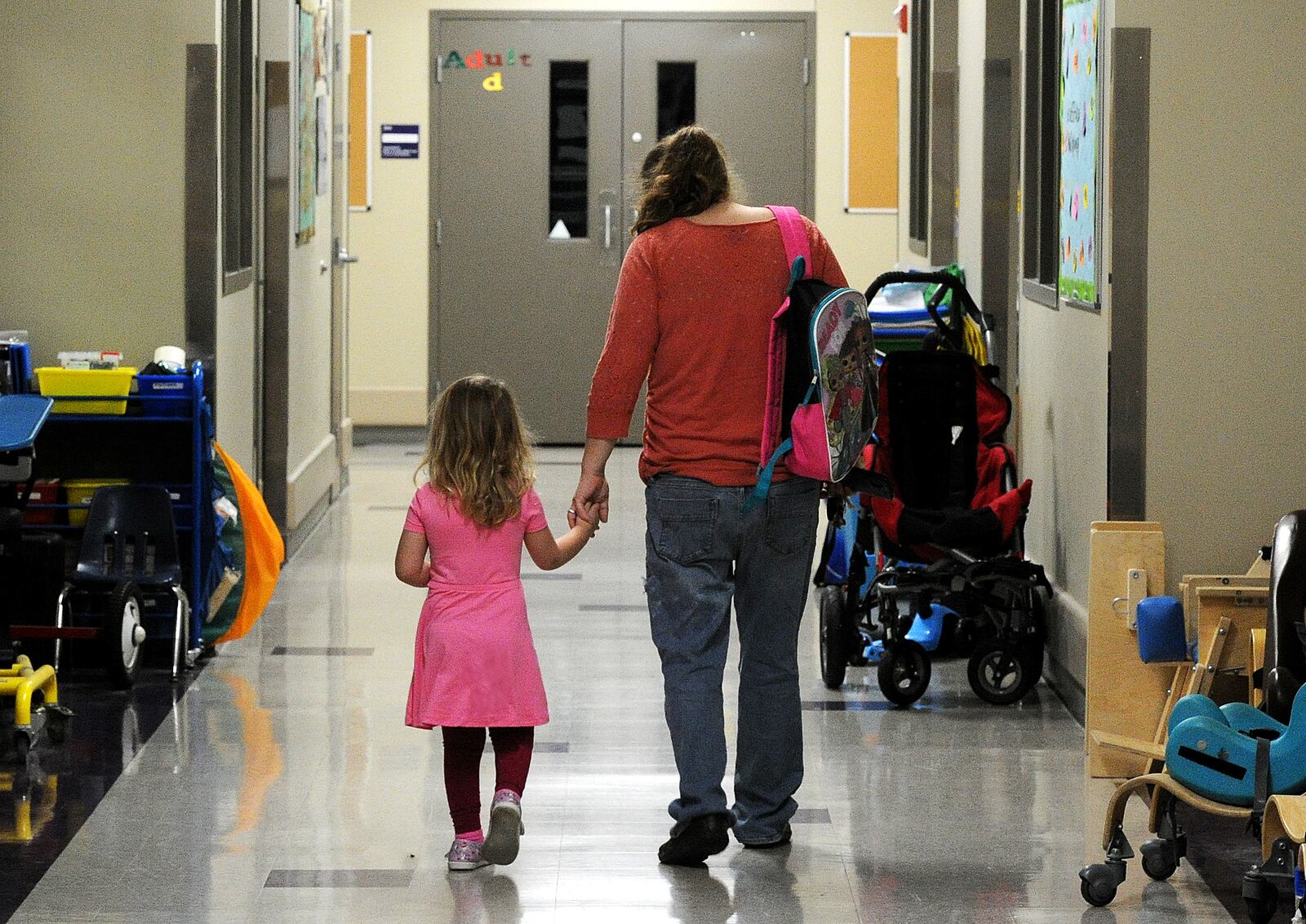 Jannet Pikos walks her daughter Mycah, 3, to preschool class at United Rehabilitation Services, 4710 Troy Pike in Montgomery County on Tuesday April 4, 2023. MARSHALL GORBY\STAFF