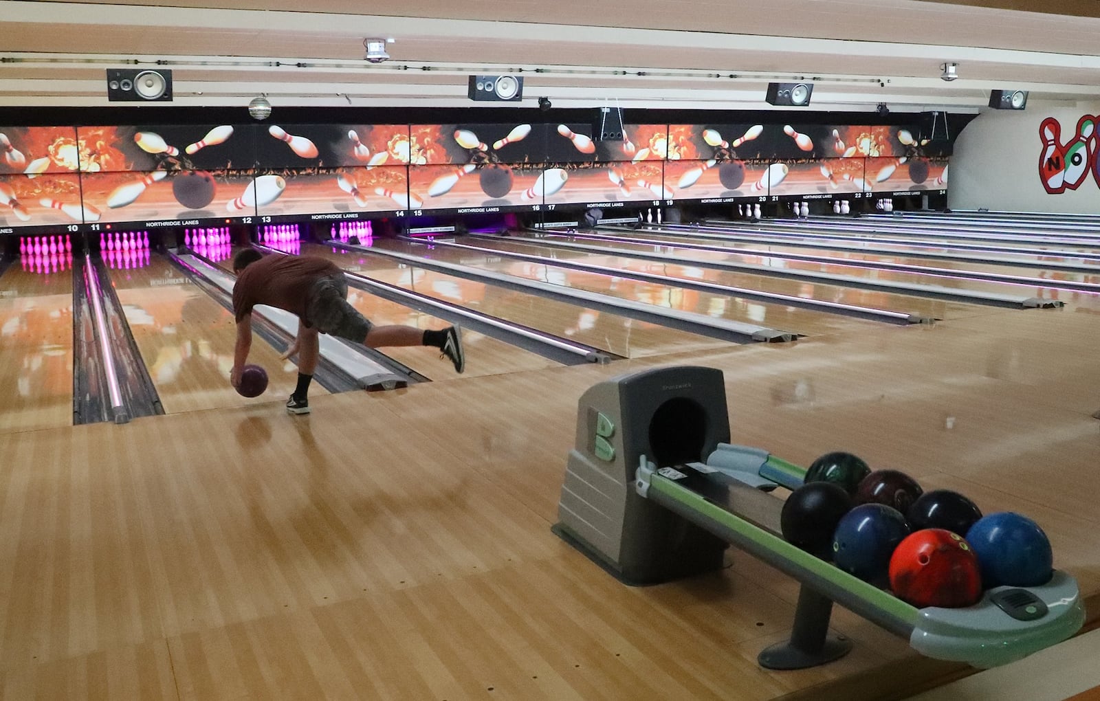 Soon after Northridge Lanes reopened Tuesday morning bowlers were taking advantage of the open lanes. BILL LACKEY/STAFF