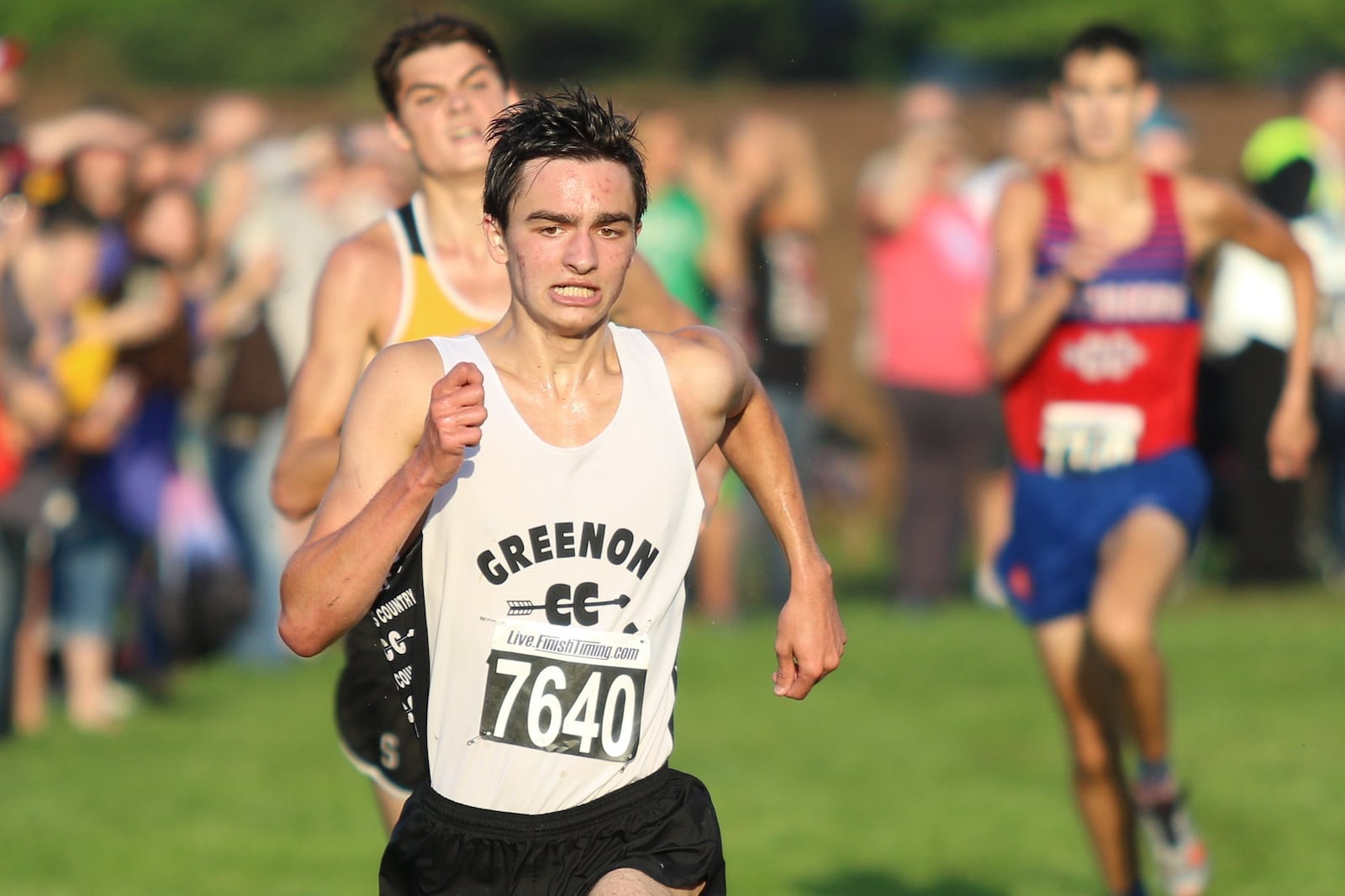 Greenon’s Calvin Wise sprints to the finish line to win the boys race at the Clark County Cross Country Championships at Young’s Dairy on Tuesday, Oct. 2, 2018. Michael Cooper/CONTRIBUTED