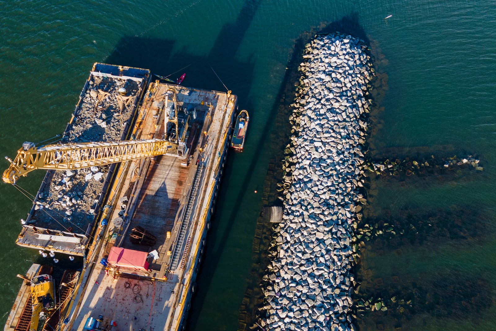 Construction is wrapping up on eight "Living Breakwaters" at the southernmost tip of New York City, off the coast of Staten Island, Wednesday, Oct. 9, 2024. (AP Photo/Ted Shaffrey)