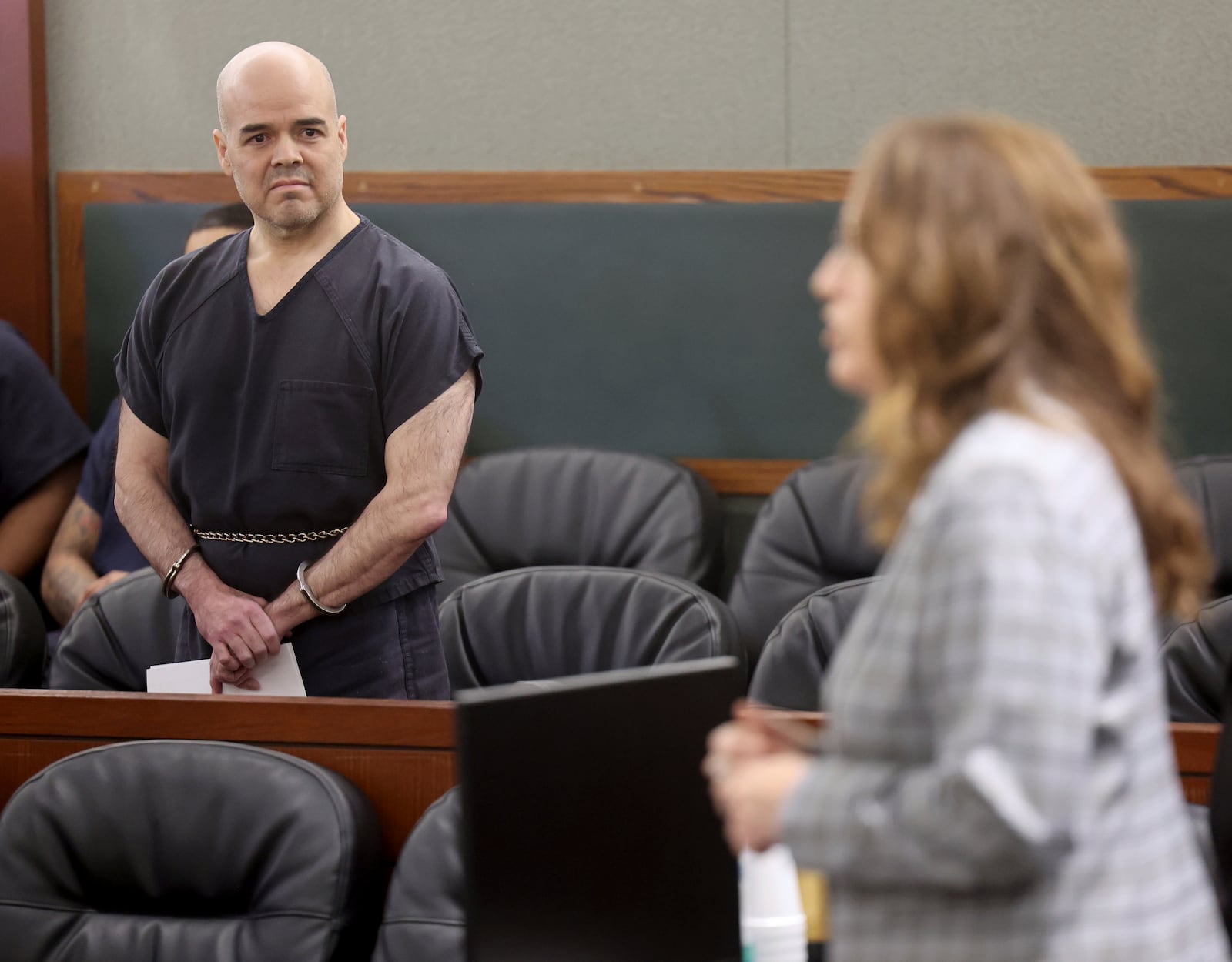 Robert Telles, left, a former Las Vegas-area Democratic elected official, listens as Chief Deputy District Attorney Pamela Weckerly addresses the court before his sentencing in the killing of an investigative journalist who wrote articles critical of his conduct in office, Wednesday, Oct. 16, 2024, at the Regional Justice Center in Las Vegas. (K.M. Cannon/Las Vegas Review-Journal via AP, Pool)