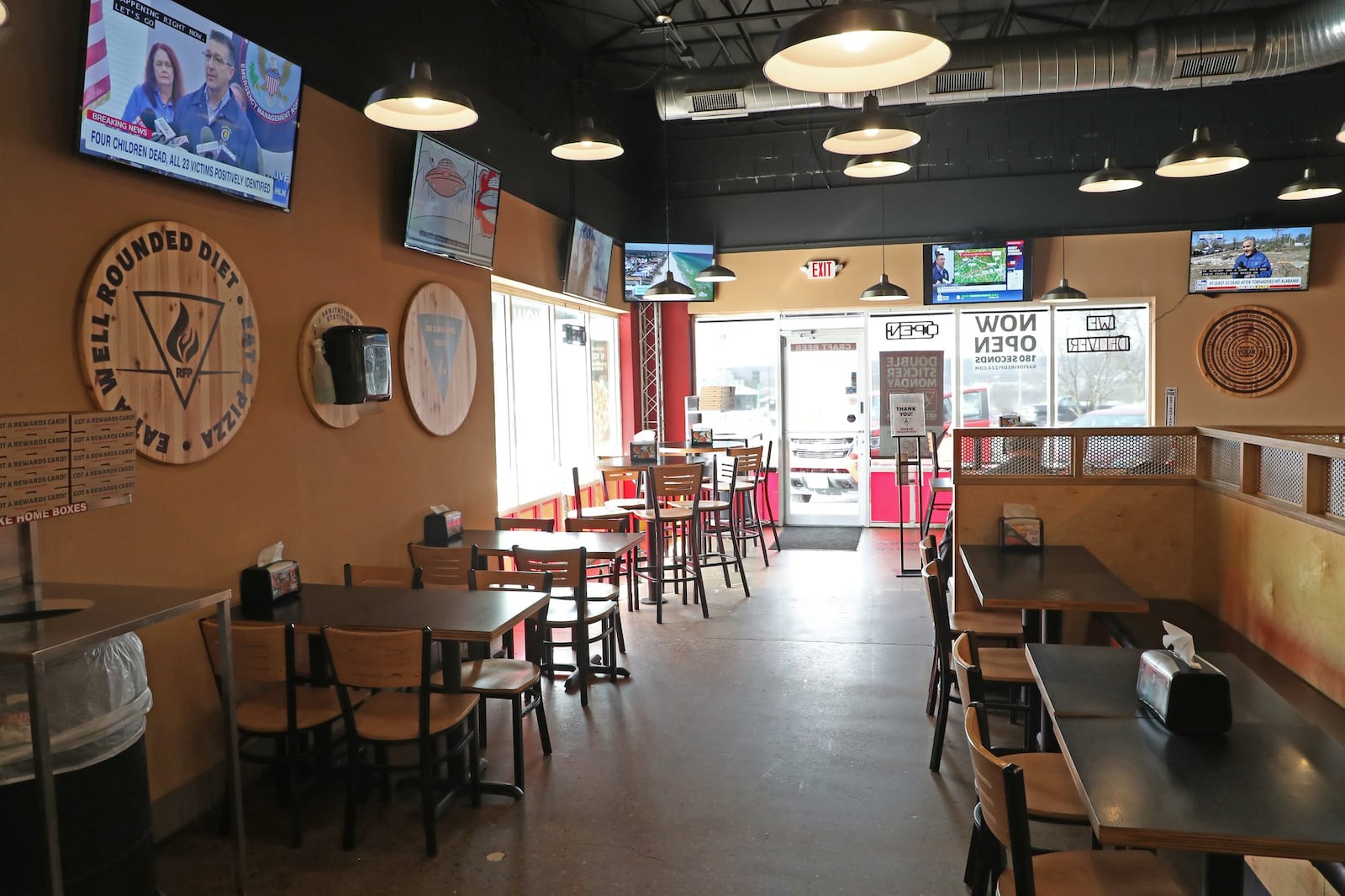 The dining room at Rapid Fired Pizza. BILL LACKEY/STAFF