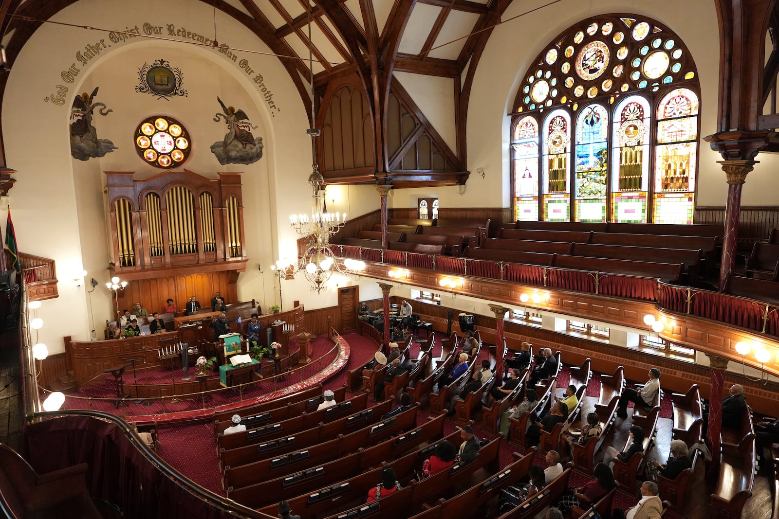 Congregants pray at Mother Bethel AME Church in Philadelphia during a service on Sunday, Sept. 29, 2024. (AP Photo/Luis Andres Henao)