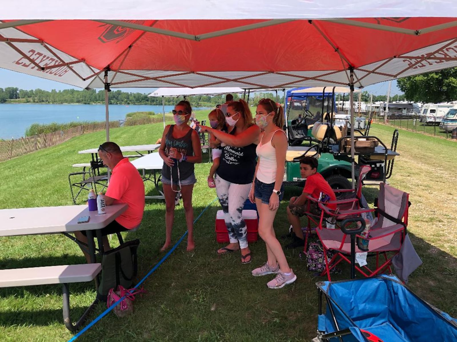 Members of the Cordell and Schilke families watched the boat races at Wake the Lake 4 on Sunday afternoon. Photo by Brett Turner