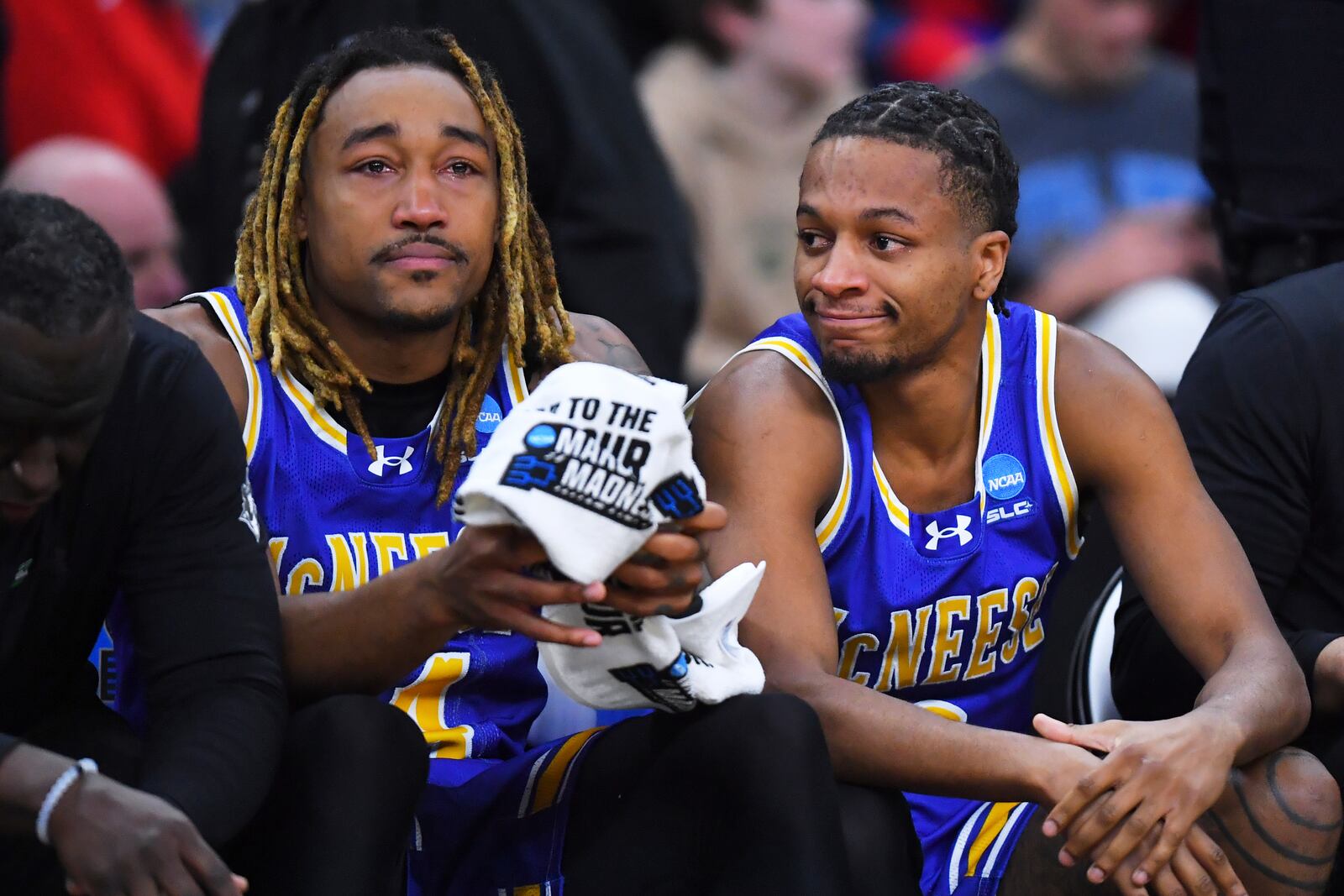 McNeese State forward Christian Shumate, left, sits on the bench with DJ Richards Jr. during the final seconds of a loss to Purdue during the second half in the second round of the NCAA college basketball tournament, Saturday, March 22, 2025, in Providence, R.I. (AP Photo/Steven Senne)