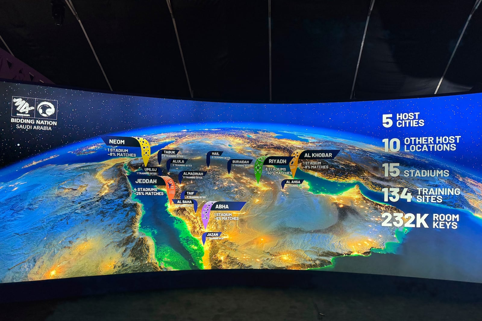 FILE - A map at the Saudi Arabia World Cup bid exhibition in Riyadh, Saudi Arabia, Wednesday Dec. 11, 2024, shows the proposed host cities and venues for the 2034 World Cup. (AP Photo/Baraa Anwer, File)