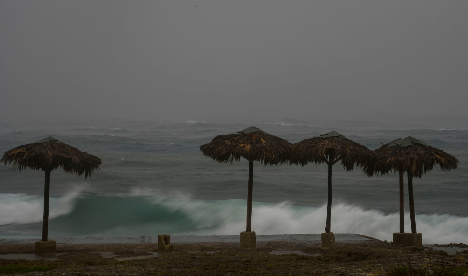 Waves break on the beach during the passing of Hurricane Rafael in Havana, Cuba, Wednesday, Nov. 6, 2024. (AP Photo/Ramon Espinosa)