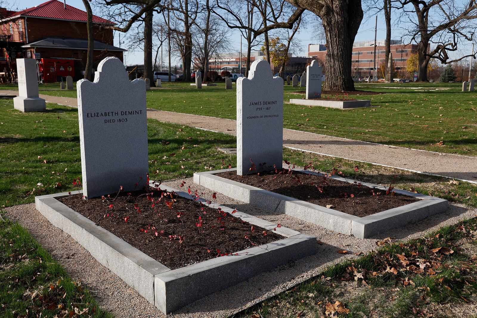 The restoration of the historic Springfield Burying Ground is nearly complete. The Burying Ground opened in 1801 and contains the final resting places of Revolutionary War soldiers, city founders and pioneers. The renovations, paid for through donations, feature walking paths, new grave markers and marker repairs along with a new fence and archway along Columbia Avenue.  BILL LACKEY/STAFF