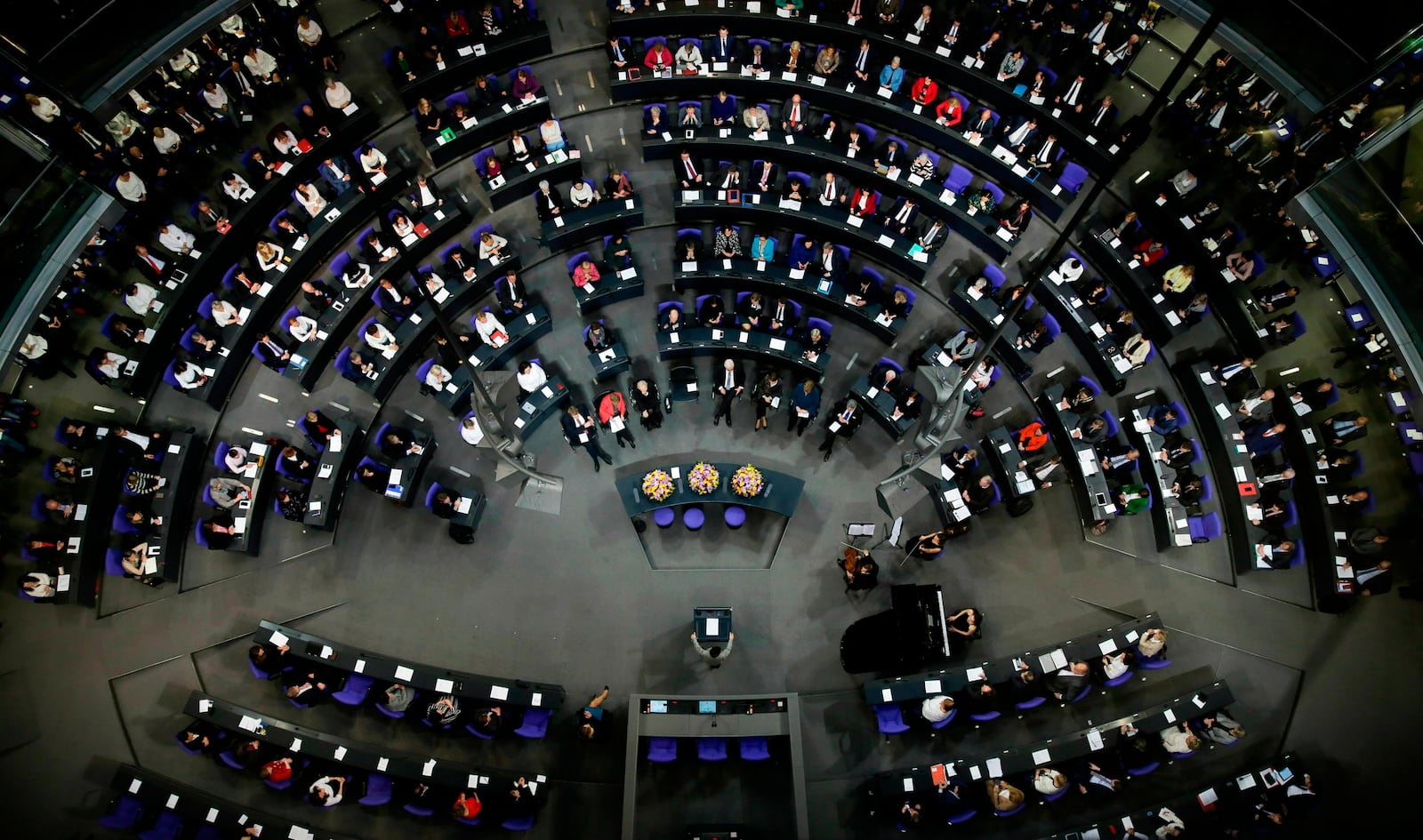 FILE - In this Thursday, Jan. 17, 2019 file photo German lawmakers attend a special parliament session at the Reichstag building, host of the German federal parliament, Bundestag, in Berlin, Germany. (AP Photo/Markus Schreiber, File)