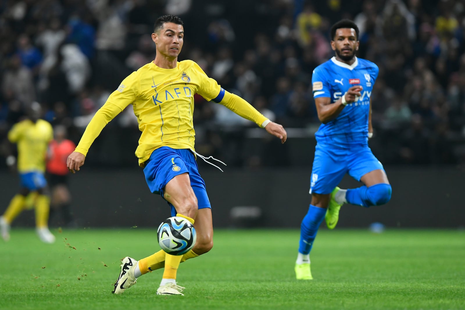 FILE - Al Nassr's Cristiano Ronaldo kicks the ball during Riyadh Season Cup 2024 final match against Al Hilal at Kingdom Arena Stadium in Riyadh, Saudi Arabia, Thursday, Feb. 8, 2024. (AP Photo, File)