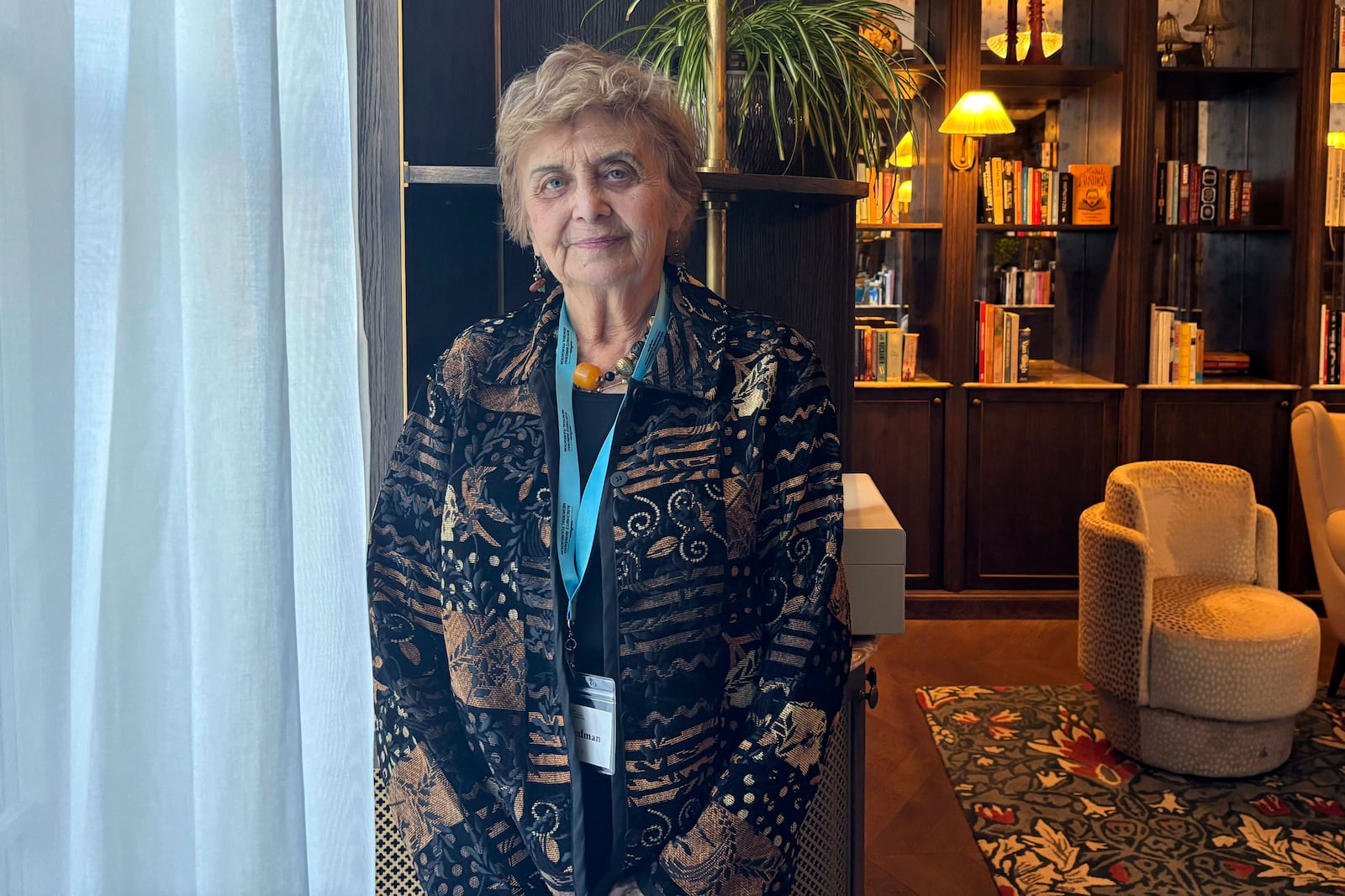 Tova Friedman, 86, who was imprisoned at Auschwitz as a little girl, poses for a photo ahead of commemorations on the 80th anniversary of the death camp's liberation, Sunday, Jan. 26. 2025, in Krakow, Poland. (AP Photo/Vanessa Gera)