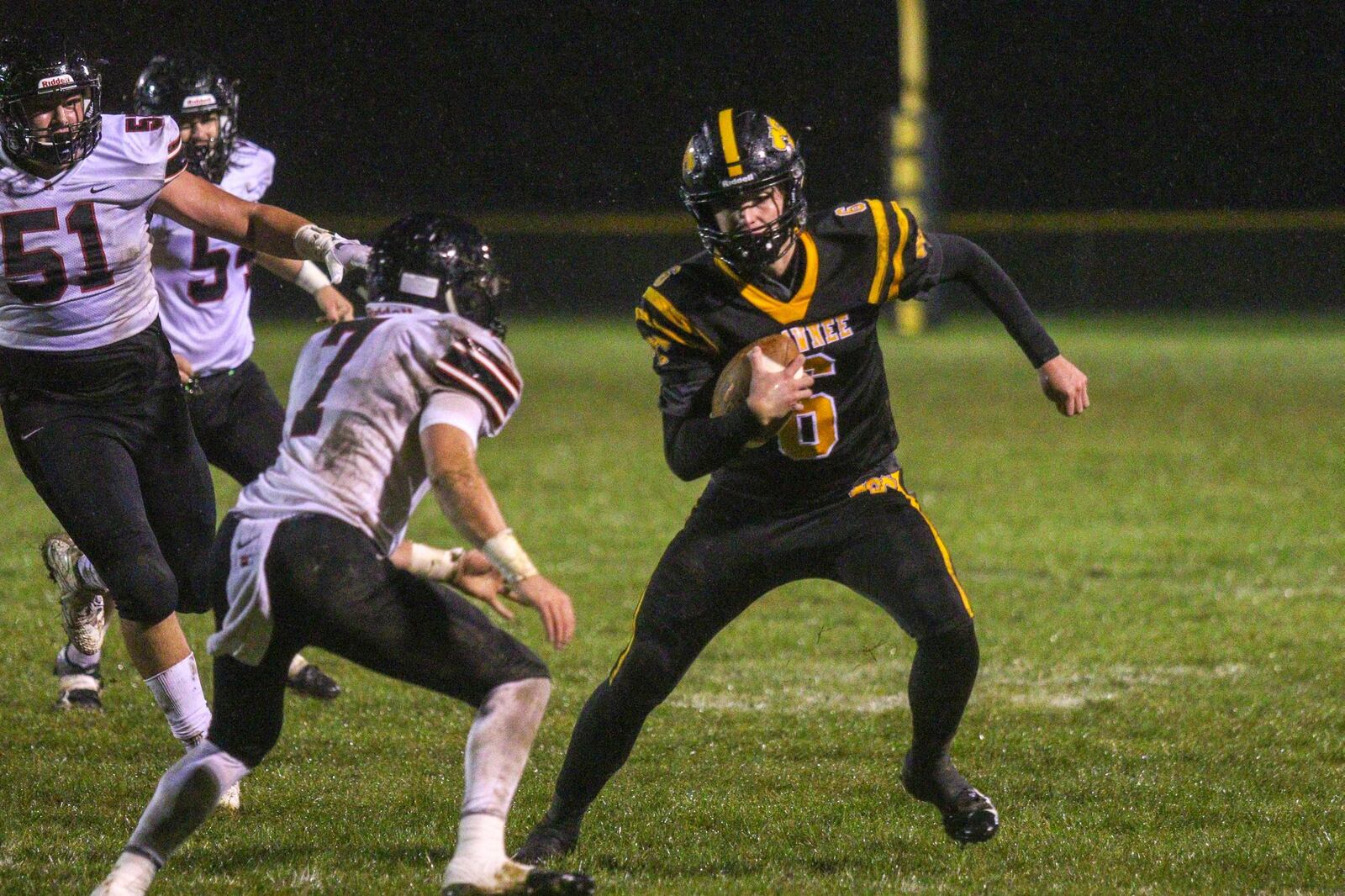 Shawnee High School sophomore Drew Mitch runs the ball during the Braves 17-14 victory over Jonathan Alder on Friday night in Springfield. CONTRIBUTED PHOTO/MICHAEL COOPER