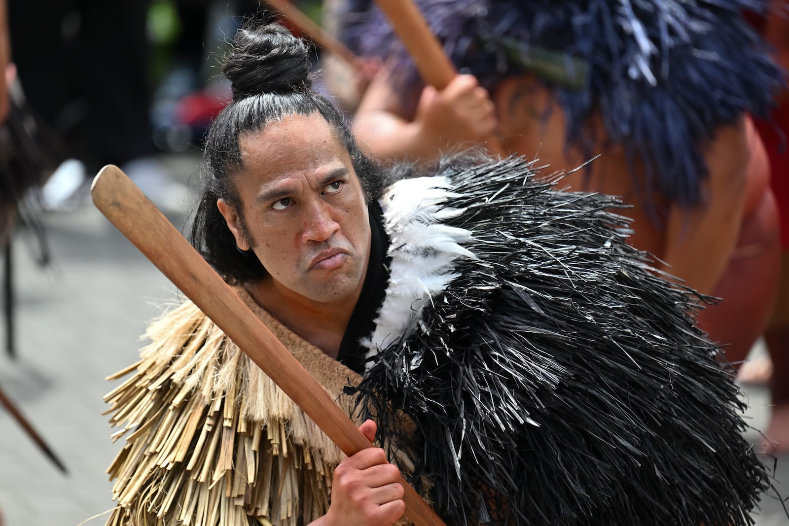 Indigenous Māori reacts outside New Zealand's parliament to protest against a proposed law that would redefine the country's founding agreement between Indigenous Māori and the British Crown, in Wellington, New Zealand, Tuesday, Nov. 19, 2024. (AP Photo/Mark Tantrum)