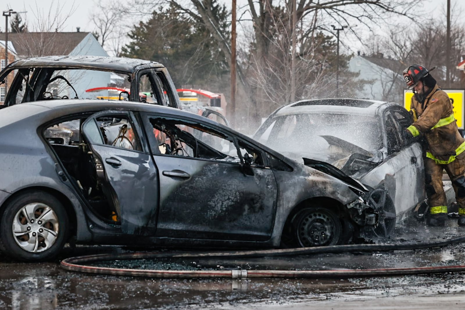 Police and medics responded to a fiery, multiple-vehicle crash with injuries Tuesday afternoon, Jan. 24, 2023, on Brandt Pike north of Chambersburg Road in Huber Heights. JIM NOELKER/STAFF