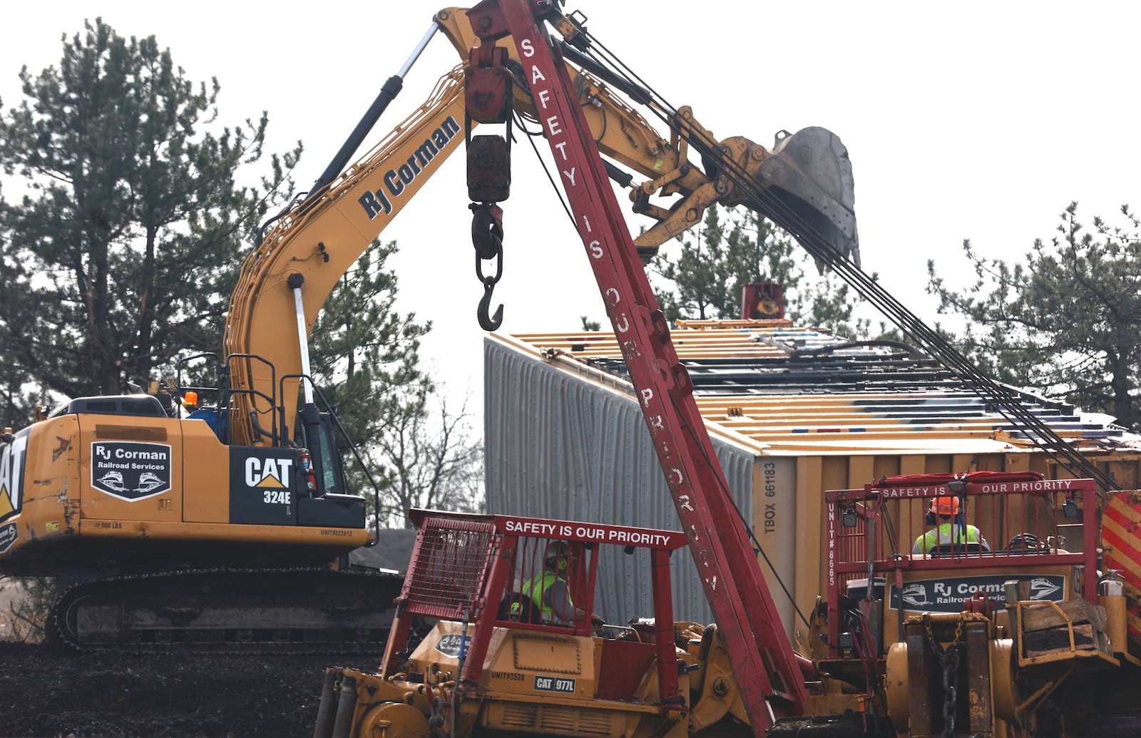 A railroad company crew work to clean up the mess Sunday, March, 5, 2023 following the train derailment in Clark County. BILL LACKEY/STAFF