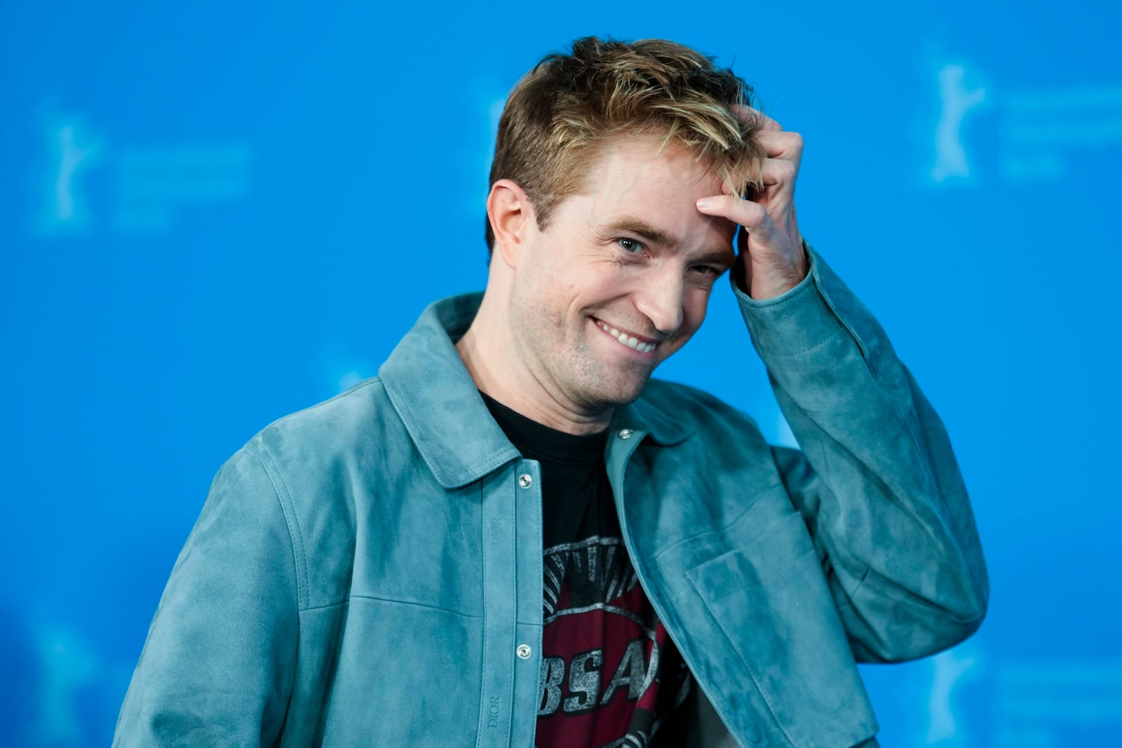 Robert Pattinson poses for photographer at the photo call for the film 'Mickey 17' at the International Film Festival, Berlinale, in Berlin, Saturday, Feb. 15, 2025. (AP Photo/Markus Schreiber)