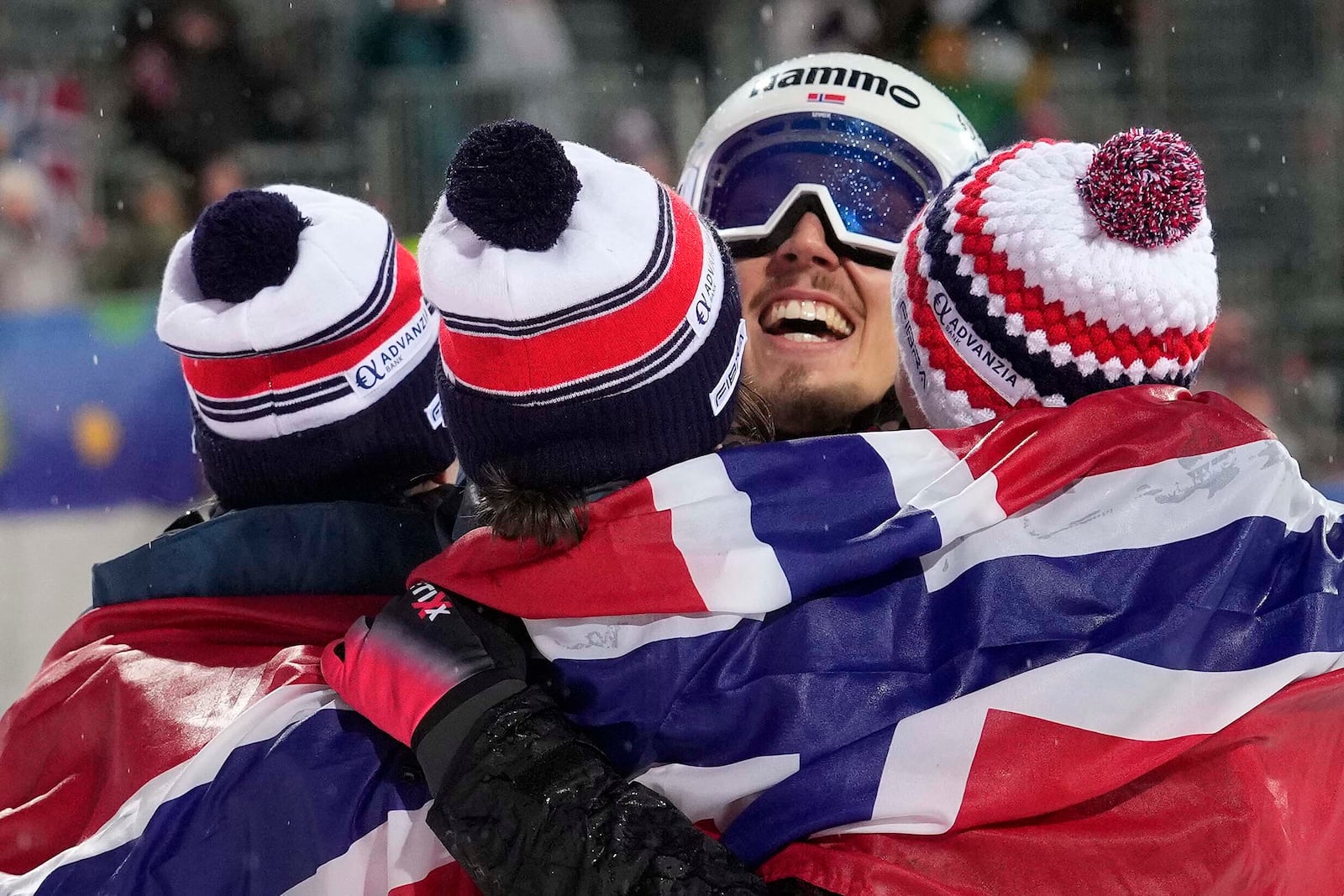 Anna Odine Stroem, Eirin Maria Kvandal, Marius Lindvik and Johann Andre Forfang of Norway celebrate after winning the Ski Jumping Mixed Team event at the Nordic World Championships in Trondheim, Norway, Wednesday, March 5, 2025. (AP Photo/Matthias Schrader)