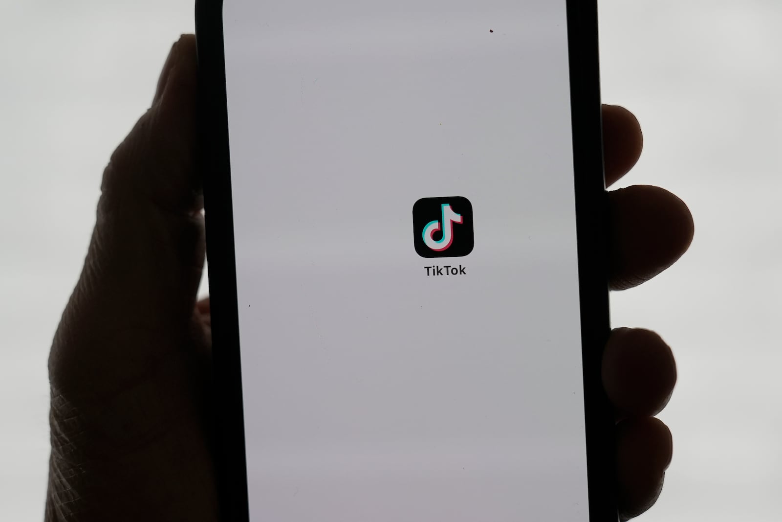 A TikTok app is shown on a phone in San Francisco, Friday, Jan. 17, 2025. (AP Photo/Jeff Chiu)