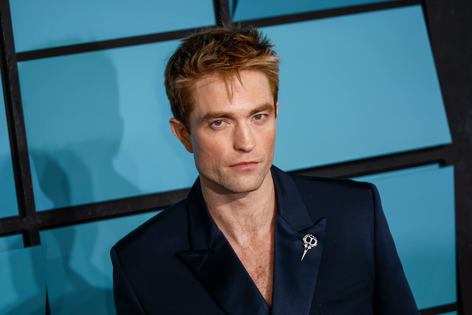 Robert Pattinson poses for photographers upon arrival at the World premiere for the film 'Mickey 17' on Thursday, Feb. 13, 2025, in London. (Photo by Joel C Ryan/Invision/AP)