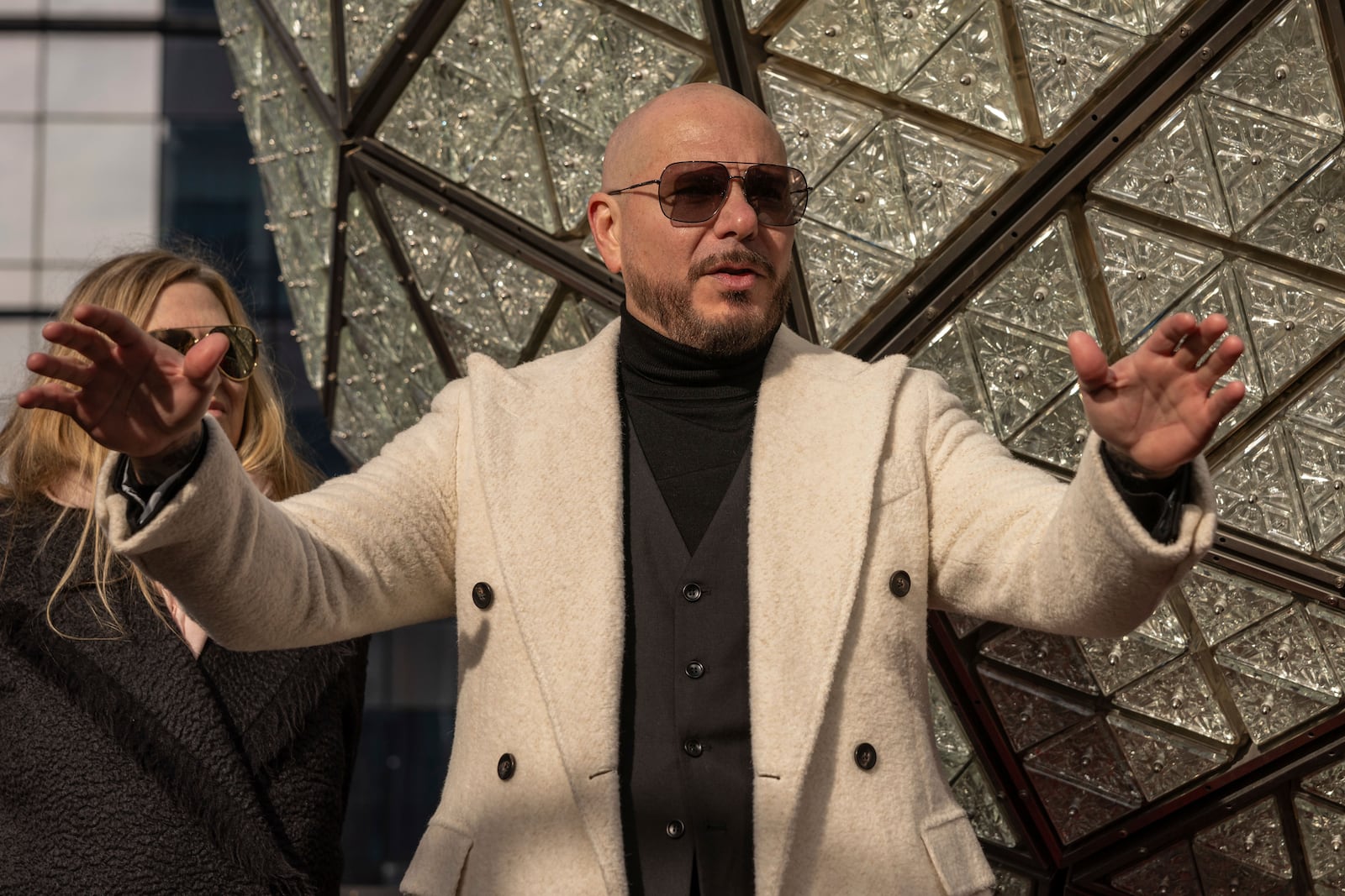 Singer Pitbull attends the Times Square New Year's Eve Ball Crystal Installation at One Times Square, Friday, Dec. 27, 2024, in New York. (AP Photo/Yuki Iwamura)