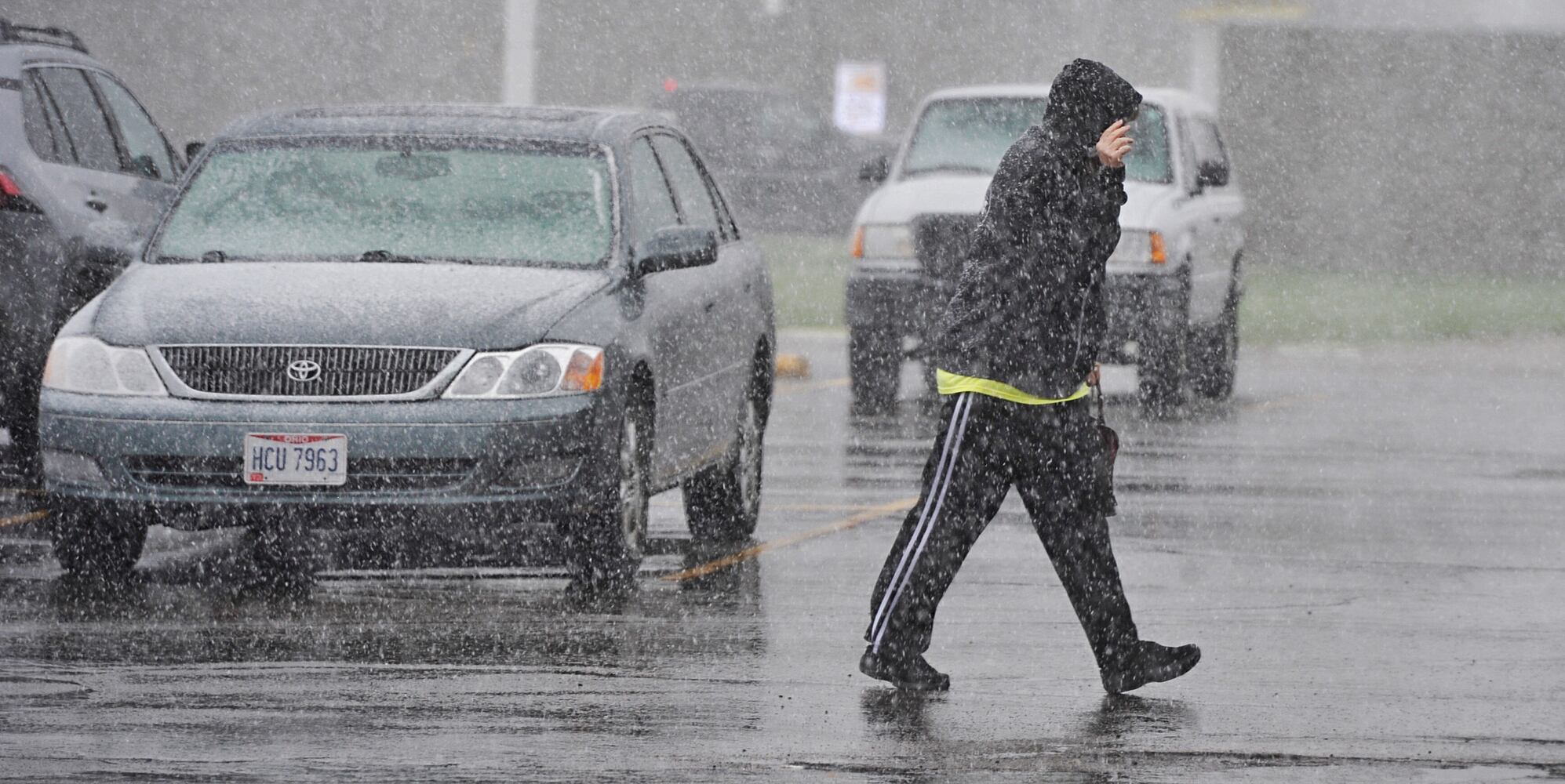 Hail, some flurries fall