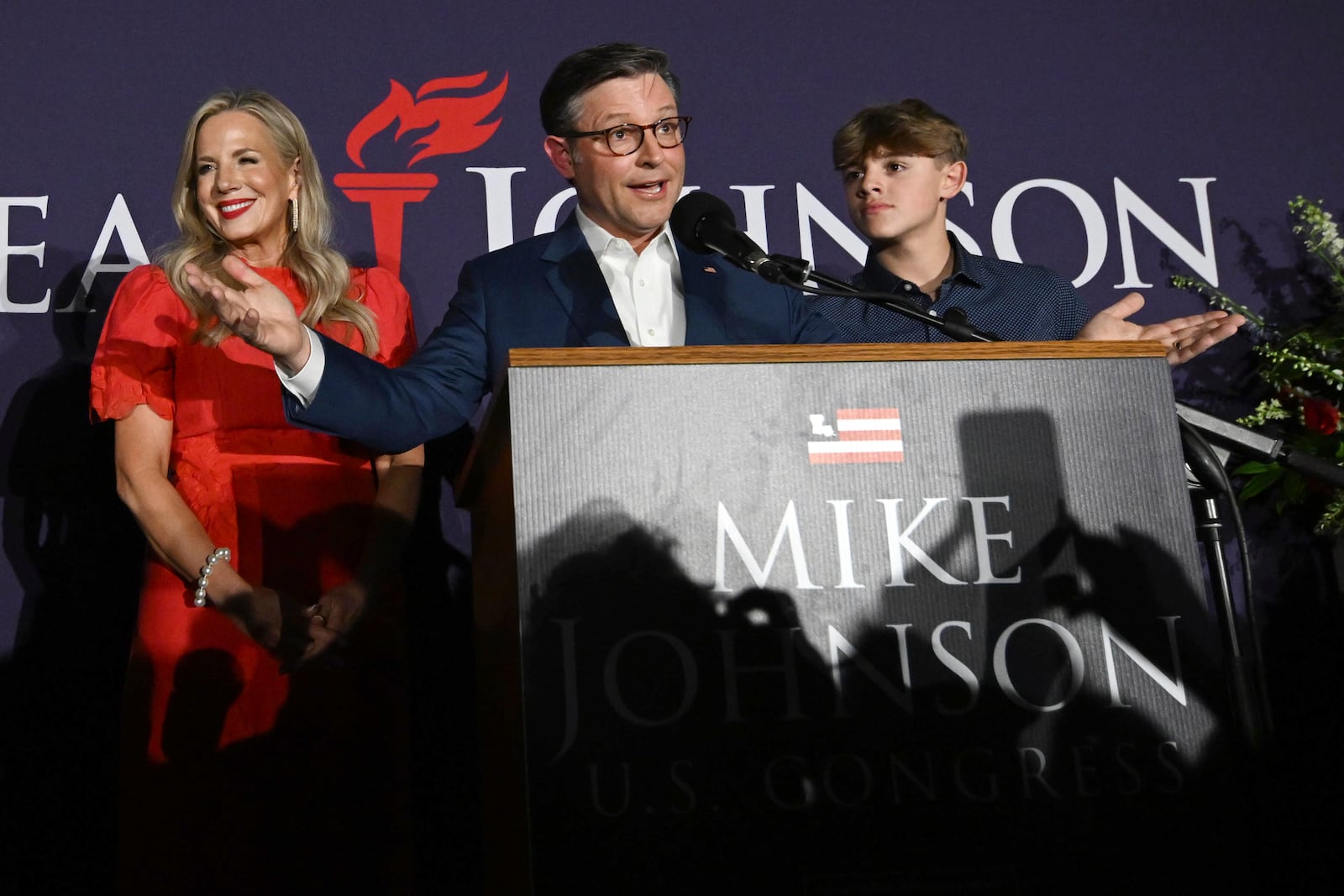 House Speaker Mike Johnson, R-La., joined his wife Kelly, left, speaks during an election night watch party Tuesday, Nov. 5, 2024, in Shreveport, La. (AP Photo/Matthew Hinton)