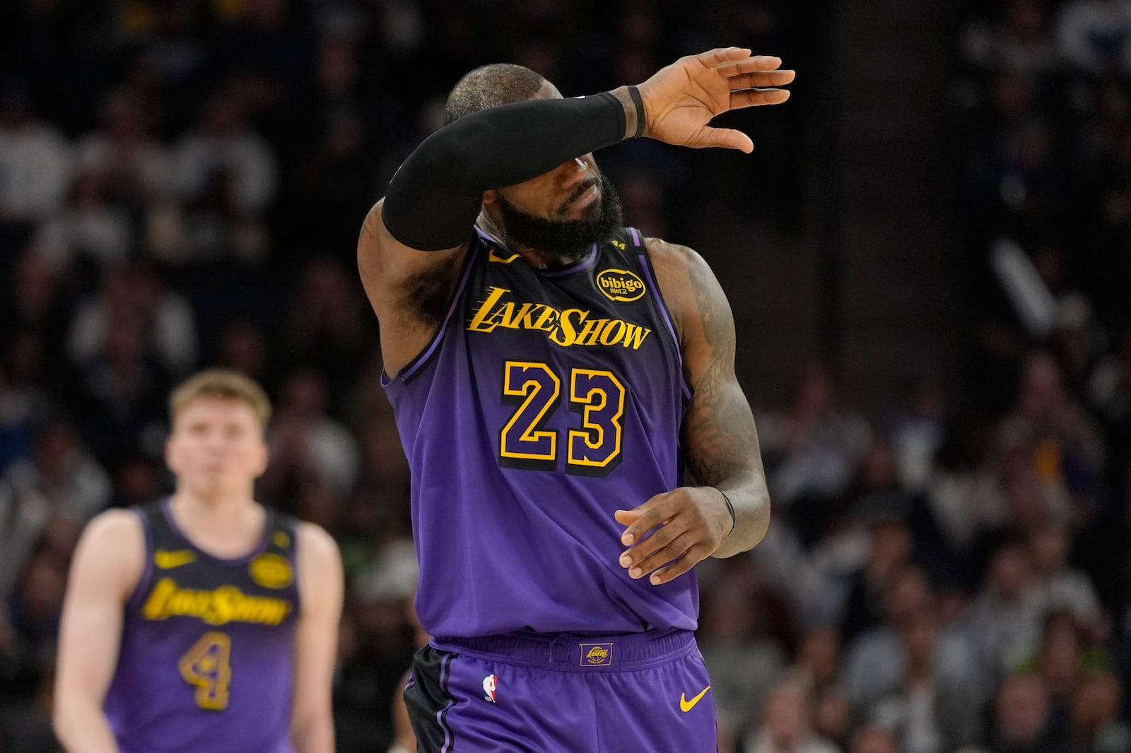 Los Angeles Lakers forward LeBron James (23) walks downcourt during the second half of an NBA basketball game against the Minnesota Timberwolves, Monday, Dec. 2, 2024, in Minneapolis. (AP Photo/Abbie Parr)