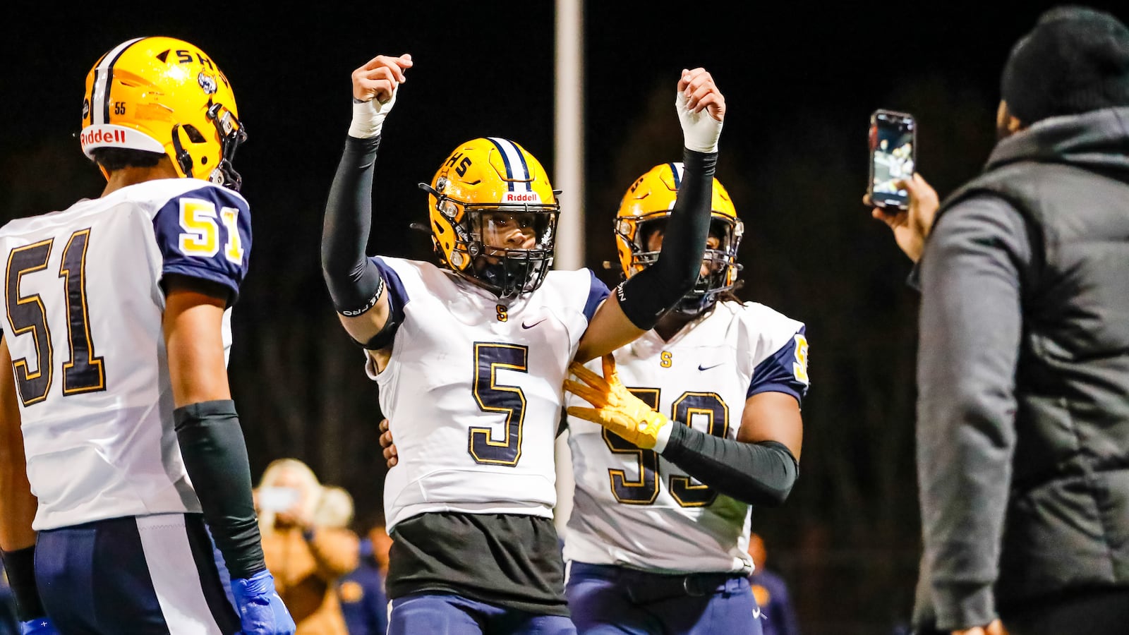 Springfield High School senior Aaron Scott celebrates after scoring a touchdown during their Division I, Region 2 playoff game against Olentangy . The Wildcats won 37-24. Michael Cooper/CONTRIBUTED