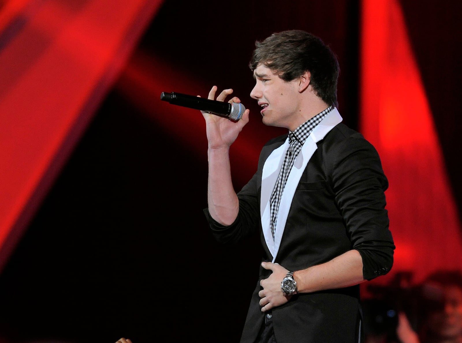 FILE - Liam Payne, of musical group One Direction, performs at Nickelodeon's 25th annual Kids' Choice Awards, March 31, 2012, in Los Angeles. (AP Photo/Chris Pizzello, File)