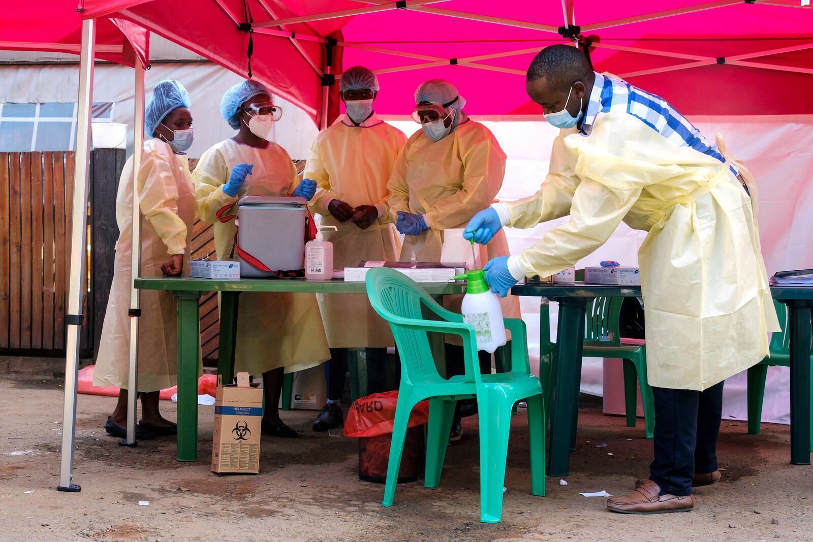 Health workers prepare to administer vaccines against the Sudan strain of Ebola, during a trial at Mulago Referral Hospital, in Kampala, Uganda Monday, Feb. 3, 2025. (AP Photo/Hajarah Nalwadda)