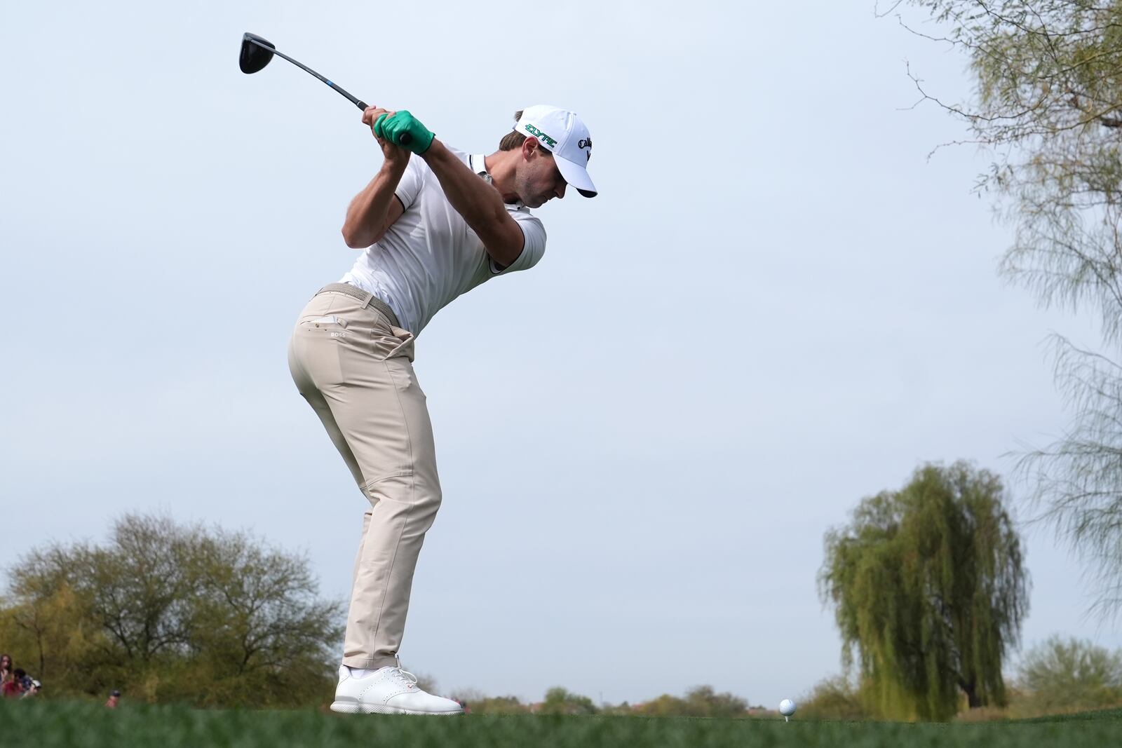 Thomas Detry, of Belgium, hits his tee shot on the third hole during the final round of the Phoenix Open golf tournament at TPC Scottsdale Sunday, Feb. 9, 2025, in Scottsdale, Ariz. (AP Photo/Ross D. Franklin)