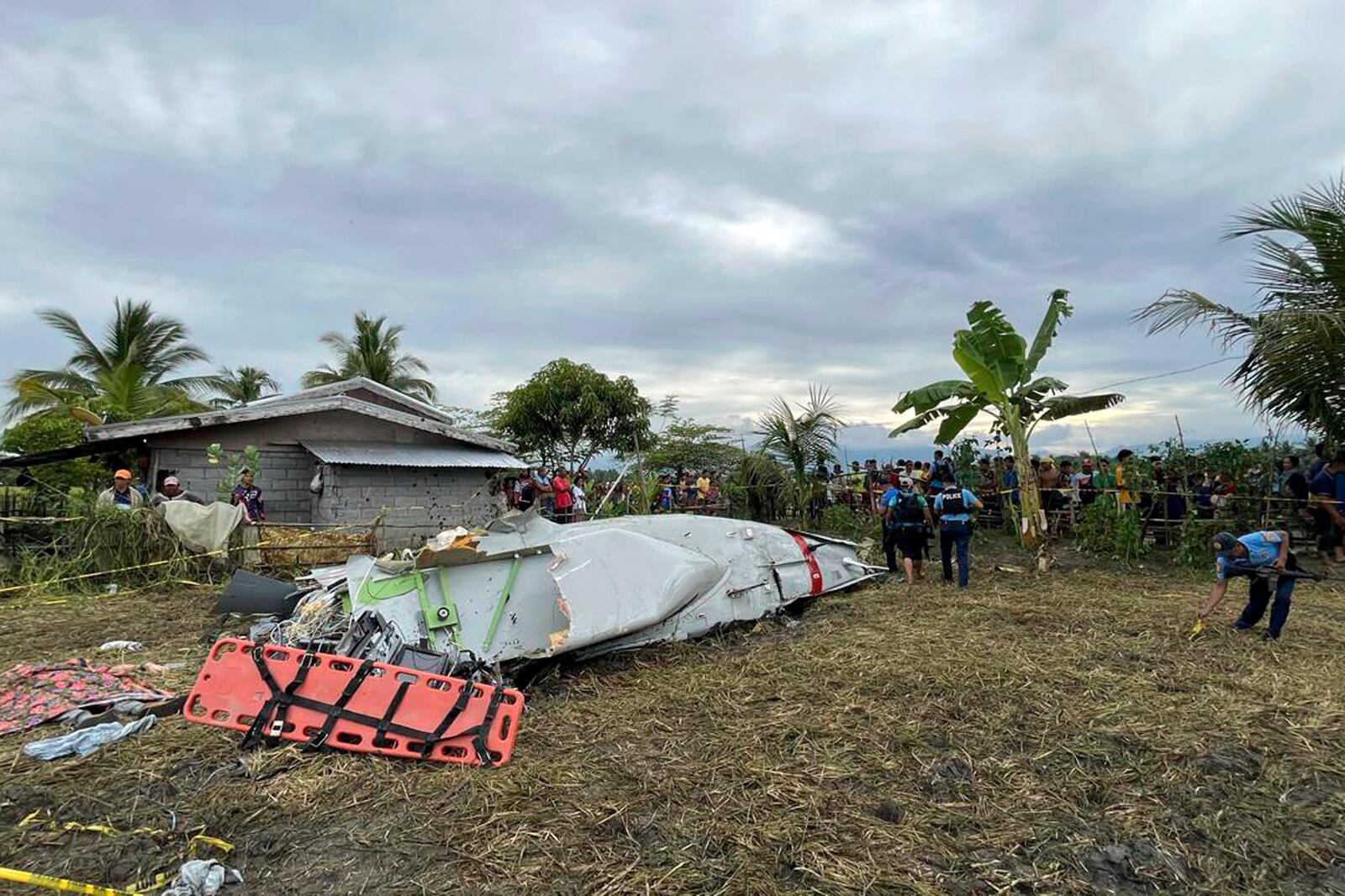 Wreckage of airplane in a rice field in Maguindanao del Sur province, Philippines, after officials say a U.S. military-contracted plane has crashed in a rice field in the southern Philippines, killing all four people on board, on Thursday Feb. 6, 2025. (Sam Mala/UGC via AP)