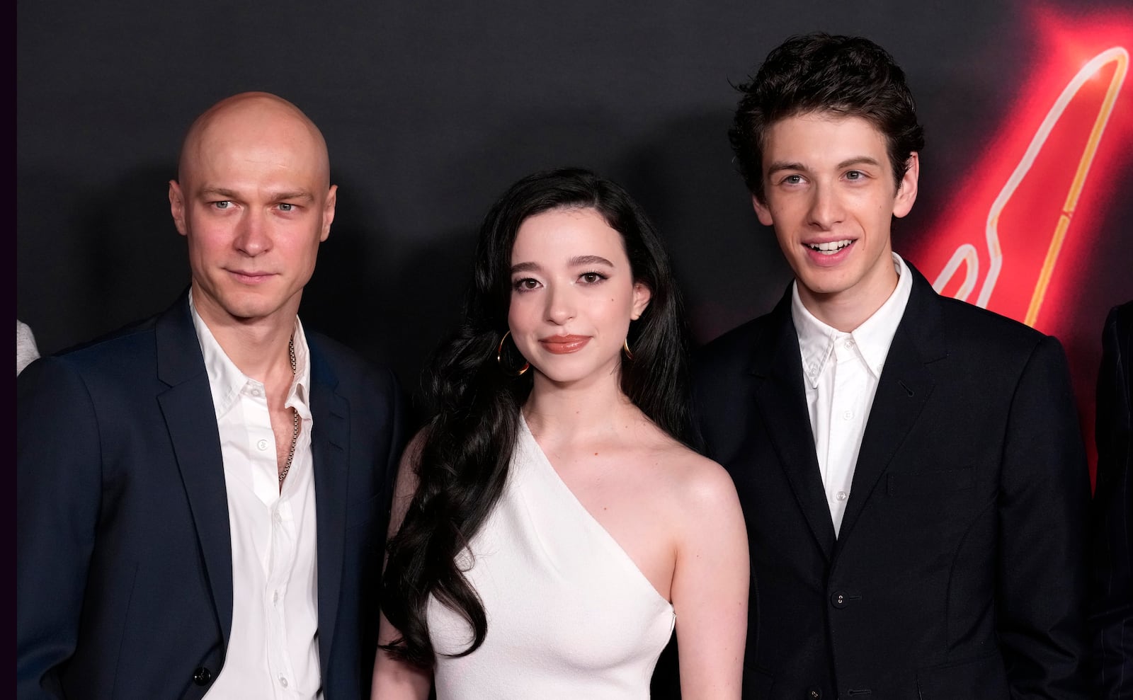 FILE - Cast members, from left, Yura Borisov, Mikey Madison and Mark Eydelshteyn, cast members in "Anora," pose together at the premiere of the film, Tuesday, Oct. 1, 2024, at the Vista Theatre in Los Angeles. (AP Photo/ Chris Pizzello, File)