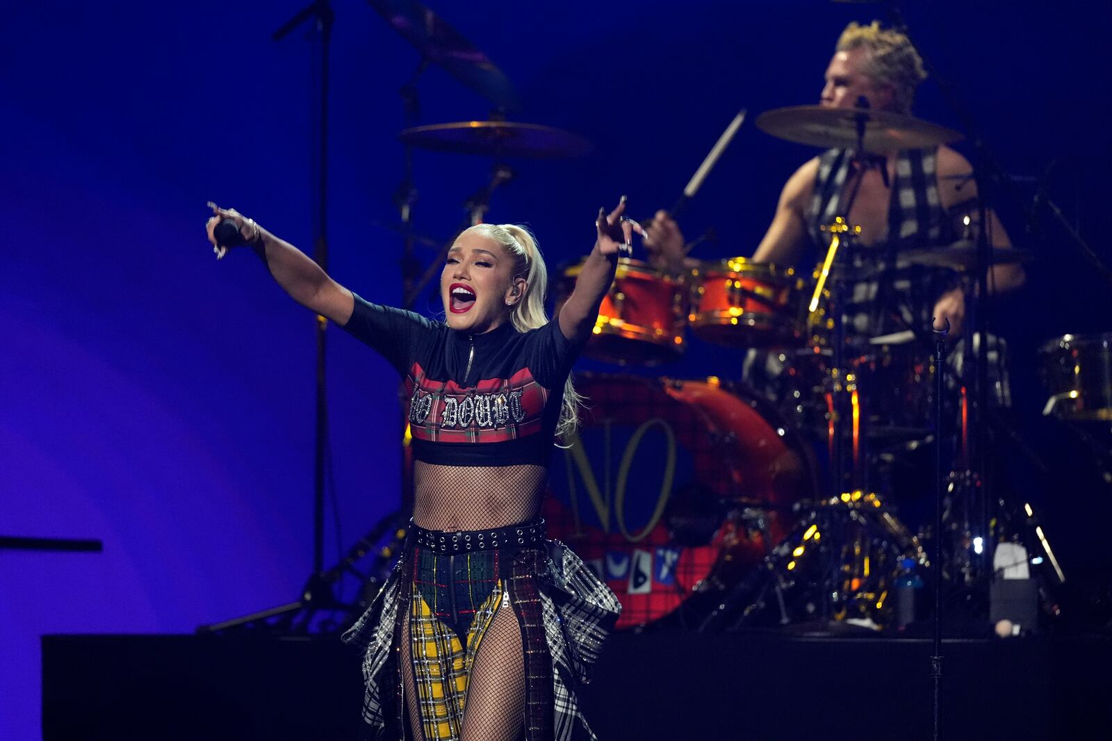 Gwen Stefani, left, and Adrian Young of No Doubt perform during the FireAid benefit concert on Thursday, Jan. 30, 2025, at The Forum in Inglewood, Calif. (AP Photo/Chris Pizzello)