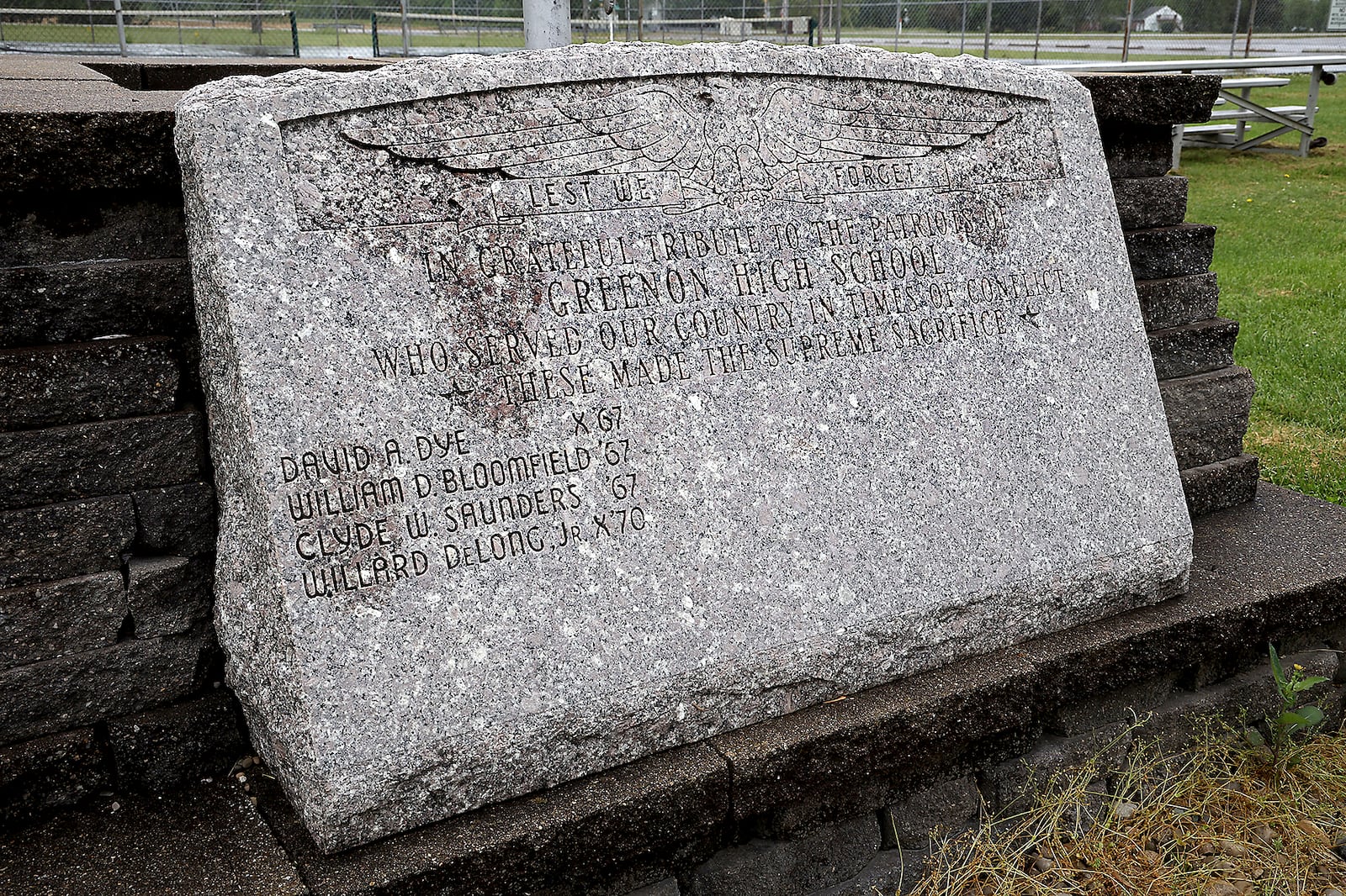 A marker with Billy Bloomfield's name along with those of three other's killed in Vietnam still stands at Greenon High School. BILL LACKEY/STAFF