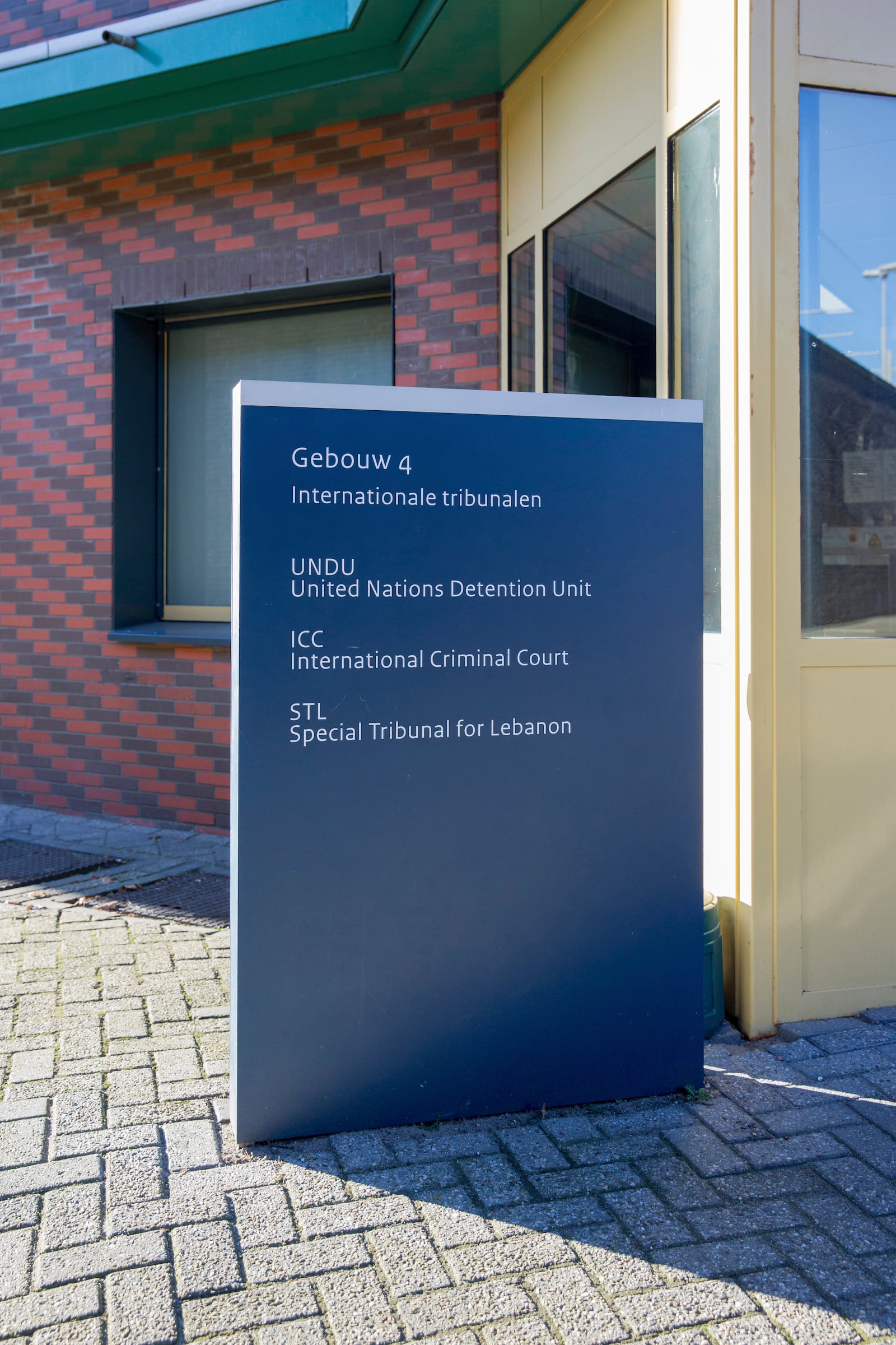 This 2017 photo provided by the International Criminal Court in The Hague, Netherlands, on Wednesday, March 12, 2025, shows a sign outside the central courtyard of the ICC Detention Center located within a Dutch prison complex in Scheveningen, Netherlands. (ICC-CPI via AP)