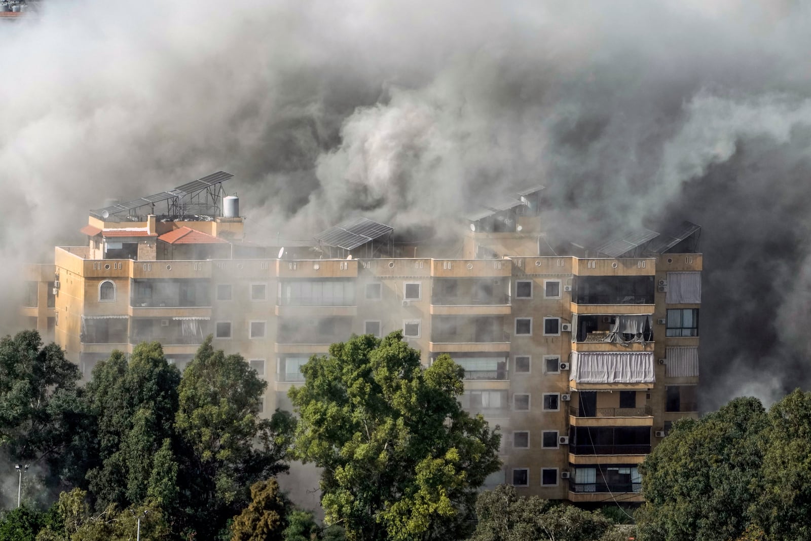 Smoke rises after an Israeli airstrike on Dahiyeh, in the southern suburb of Beirut, Lebanon, Tuesday, Nov. 12, 2024. (AP Photo/Bilal Hussein)