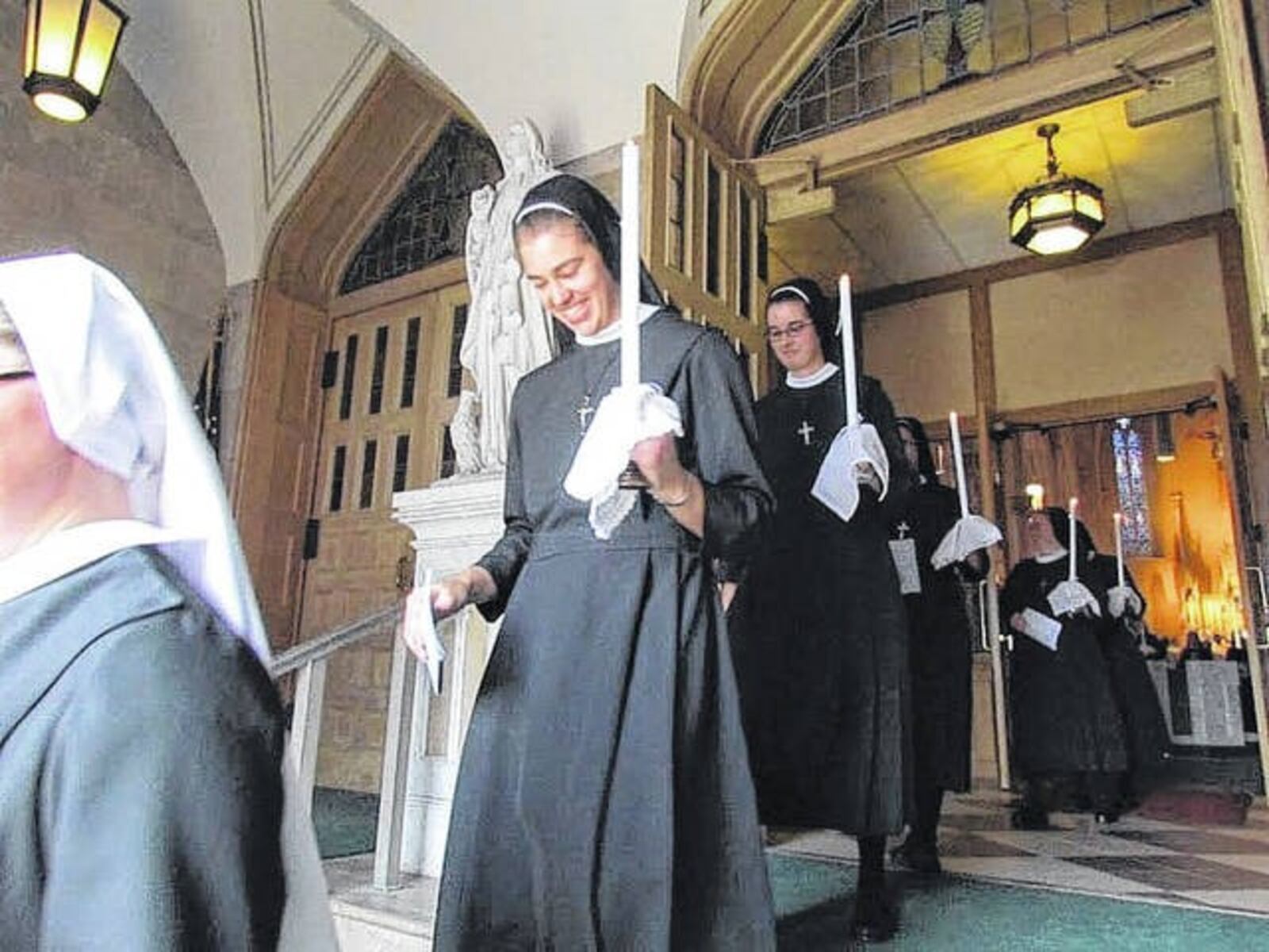 Sister Mary Xavier leaving church in Alton, Illinois after making her first vows to the order of Sisters of St, Francis of the Martyr St. George in 2015. CONTRIBUTED