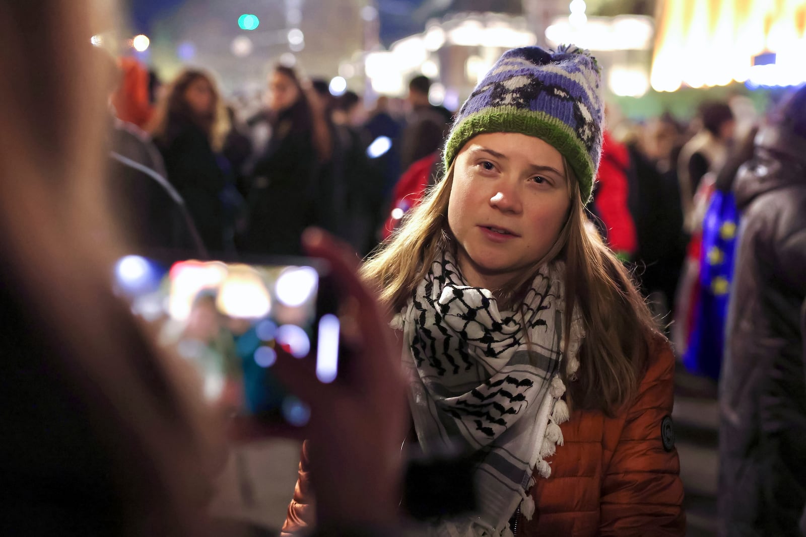 Sweden's climate activist Greta Thunberg takes part in a rally against alleged violations in a recent parliamentary election in Tbilisi, Georgia, on Monday, Nov. 4, 2024. (AP Photo)