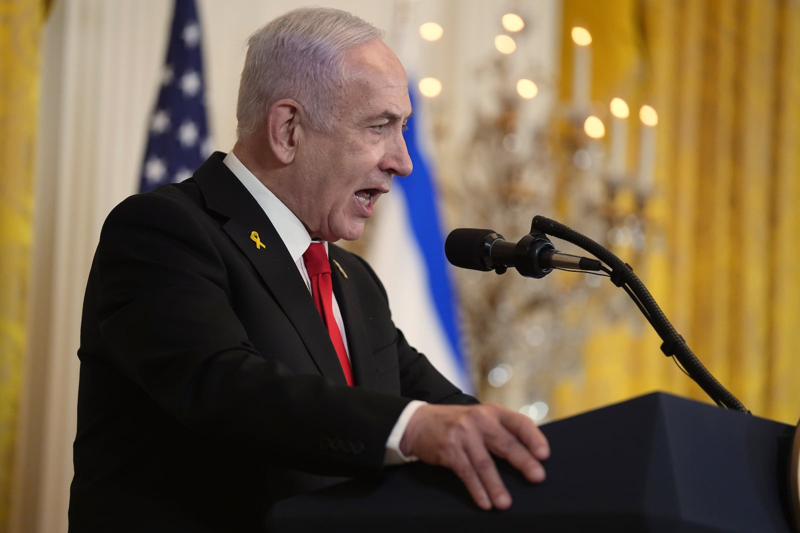 Israel's Prime Minister Benjamin Netanyahu speaks during a news conference With President Donald Trump in the East Room of the White House, Tuesday, Feb. 4, 2025, in Washington. (AP Photo/Evan Vucci)