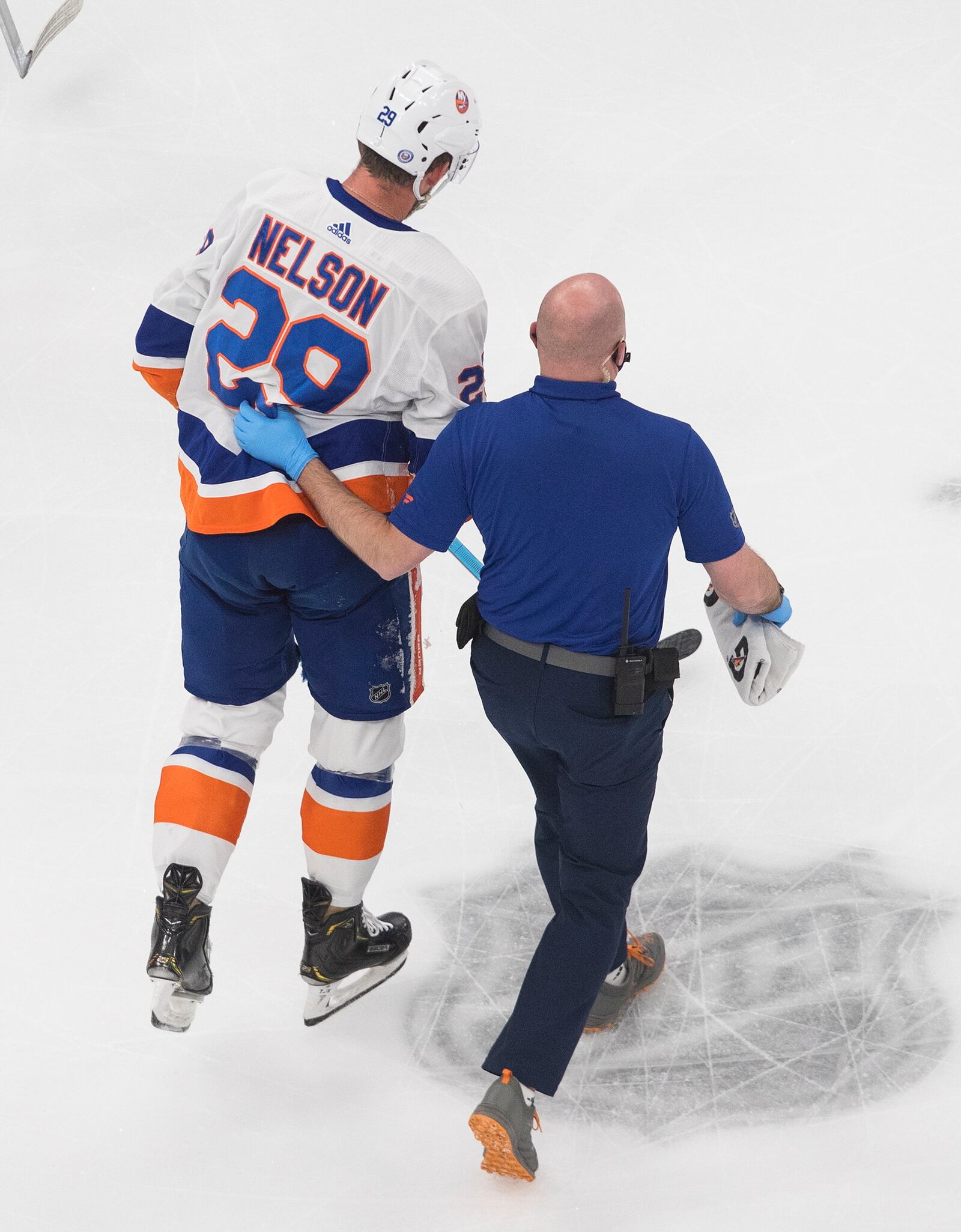 New York Islanders' Brock Nelson (29) leaves the ice with an apparent injury during the first period of Game 2 of the NHL hockey Eastern Conference final against the Tampa Bay Lightning, Wednesday, Sept. 9, 2020, in Edmonton, Alberta. (Jason Franson/The Canadian Press via AP)