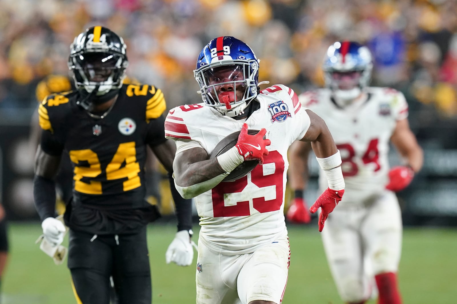 New York Giants running back Tyrone Tracy Jr. (29) runs for a touchdown during the second half of an NFL football game against the Pittsburgh Steelers, Monday, Oct. 28, 2024, in Pittsburgh. (AP Photo/Matt Freed)