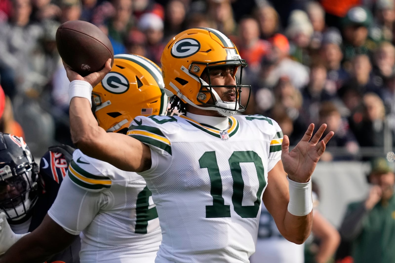 Green Bay Packers' Jordan Love throws during the first half of an NFL football game against the Chicago Bears Sunday, Nov. 17, 2024, in Chicago. (AP Photo/Nam Y. Huh)