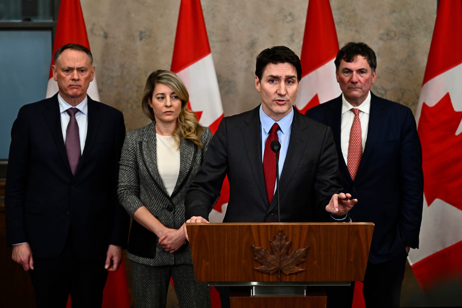 Canadian Prime Minister Justin Trudeau addresses media members after U.S. President Donald Trump signed an order to impose stiff tariffs on imports from Mexico, Canada and China, in Ottawa, Canada, Saturday, Feb. 1, 2025. (Justin Tang/The Canadian Press via AP)