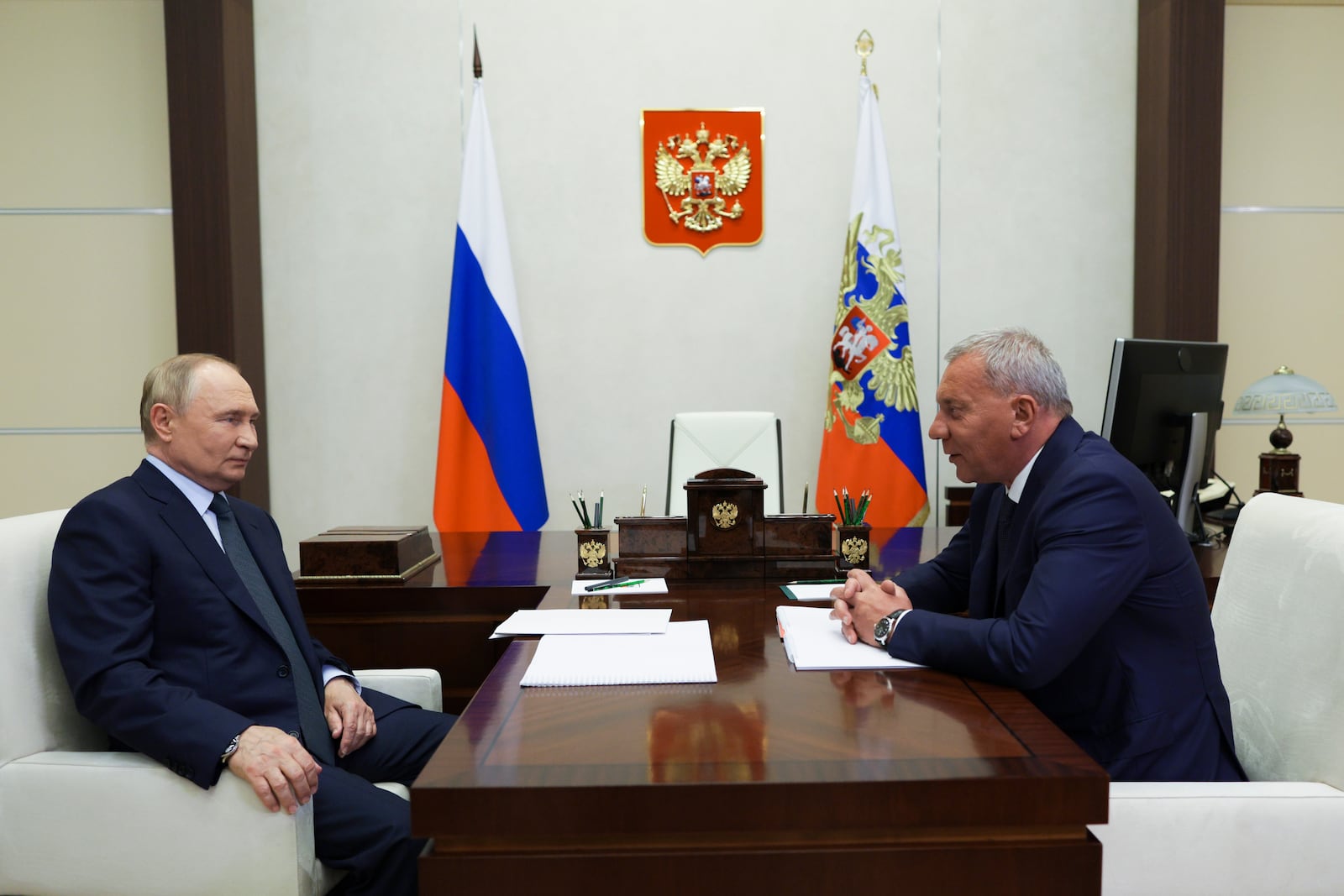 Russian President Vladimir Putin, left, speaks with the head of Russian state space corporation Roscosmos Yuri Borisov during their meeting at Novo-Ogaryovo state residence outside of Moscow, Russia, Friday, Nov. 15, 2024. (Vyacheslav Prokofyev, Sputnik, Kremlin Pool Photo via AP)