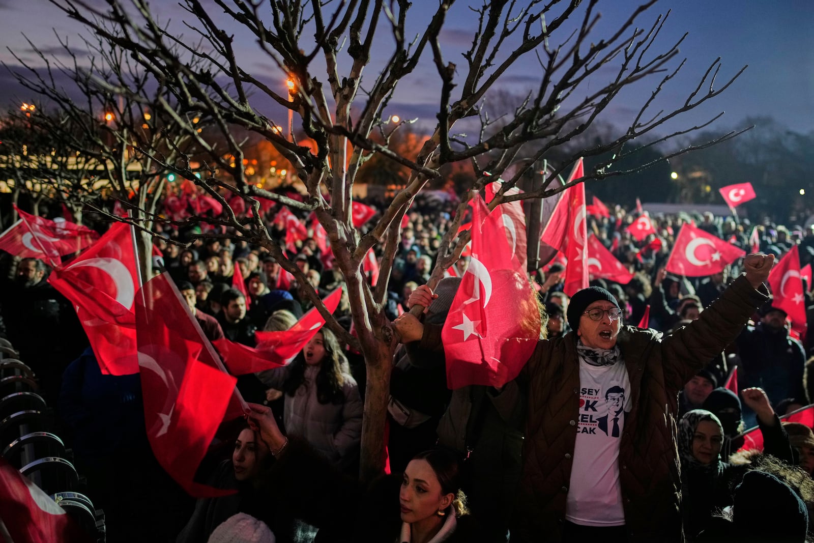 People gather outside the City Hall to protest the arrest of Istanbul Mayor Ekrem Imamoglu in Istanbul, Turkey, Wednesday, March 19, 2025. (AP Photo/Emrah Gurel)