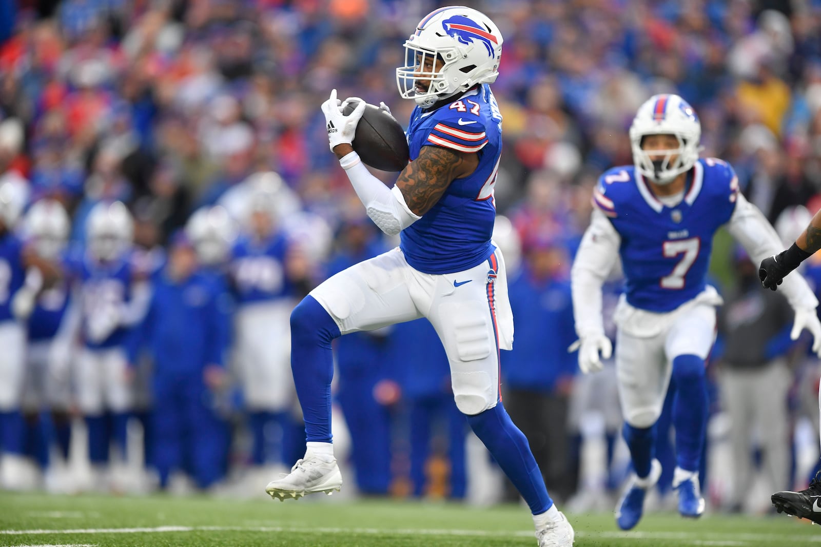 Buffalo Bills defensive end AJ Epenesa (57) intercepts a pass during the second half of an NFL football game against the New York Jets, Sunday, Dec. 29, 2024, in Orchard Park, N.Y. (AP Photo/Adrian Kraus)